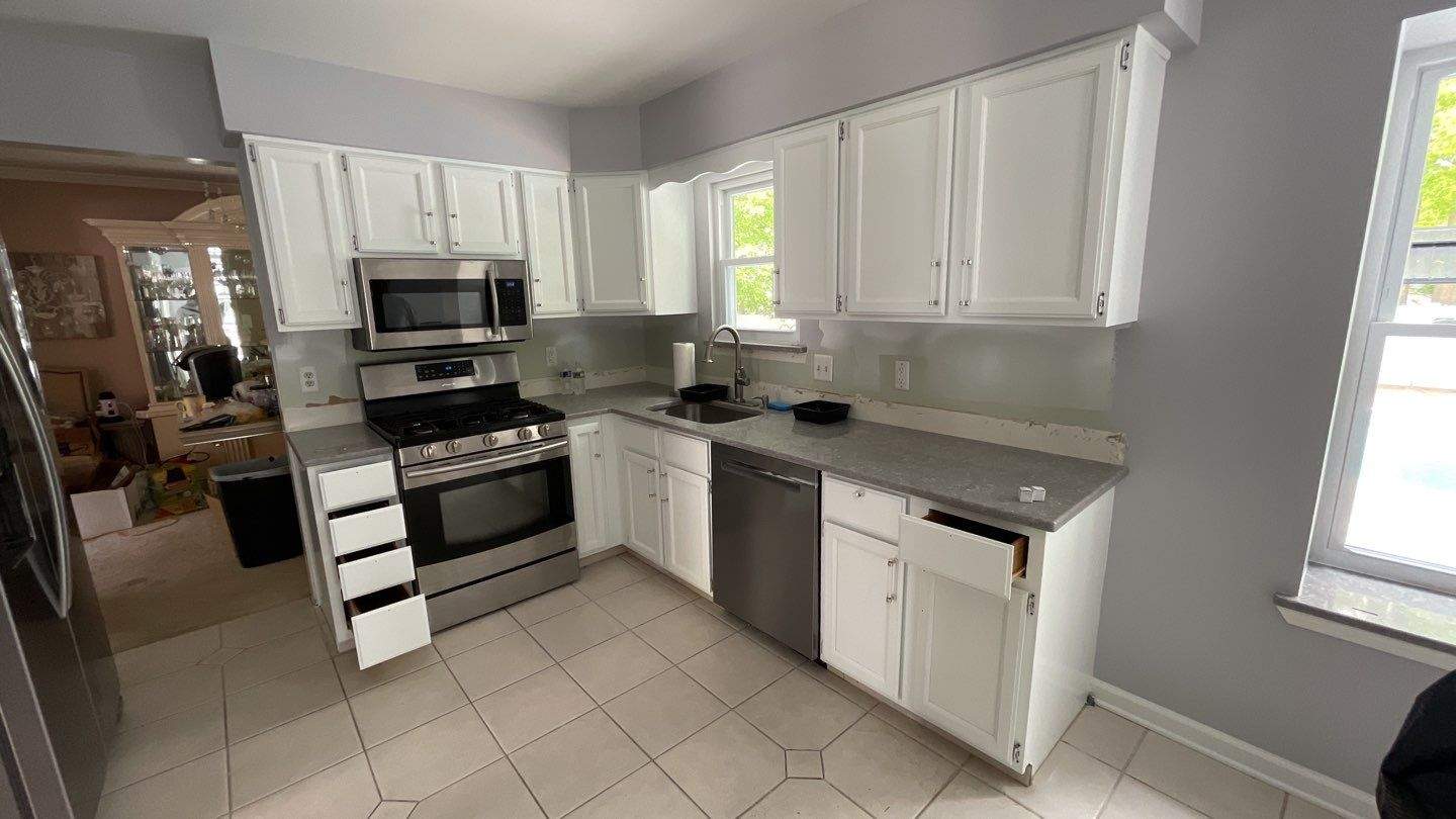 Kitchen Cabinet Painting by GLSpainters