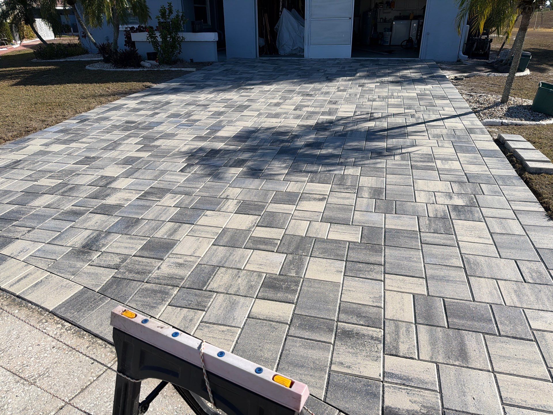Multi-Tone Gray Paver Driveway Sealing in Sun City Center by Supreme Paver Experts