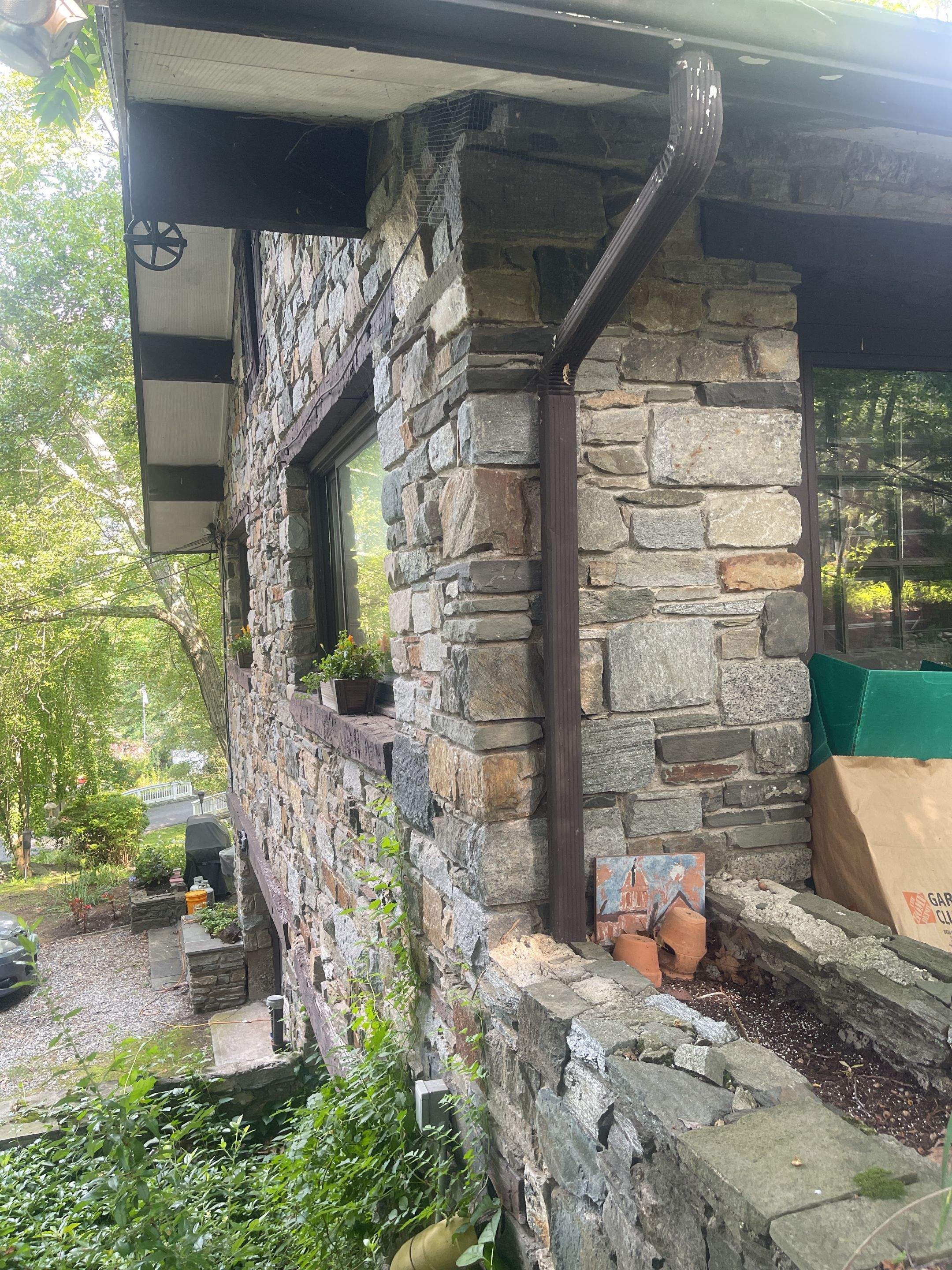 Gutter Installation using 5k Brown Gutters by A Plus Exterior