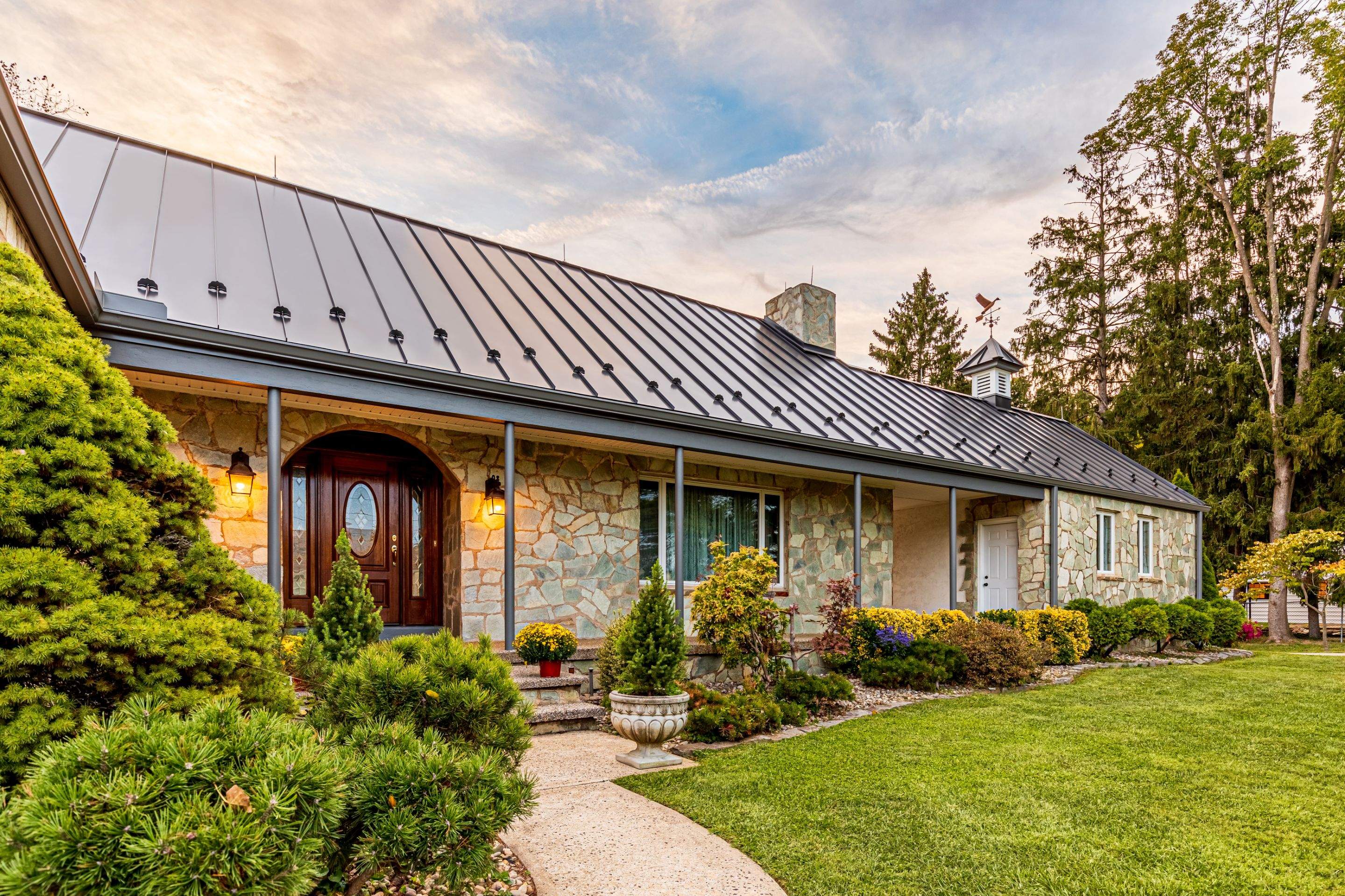 Standing Seam Metal roof-black by Esh Builders