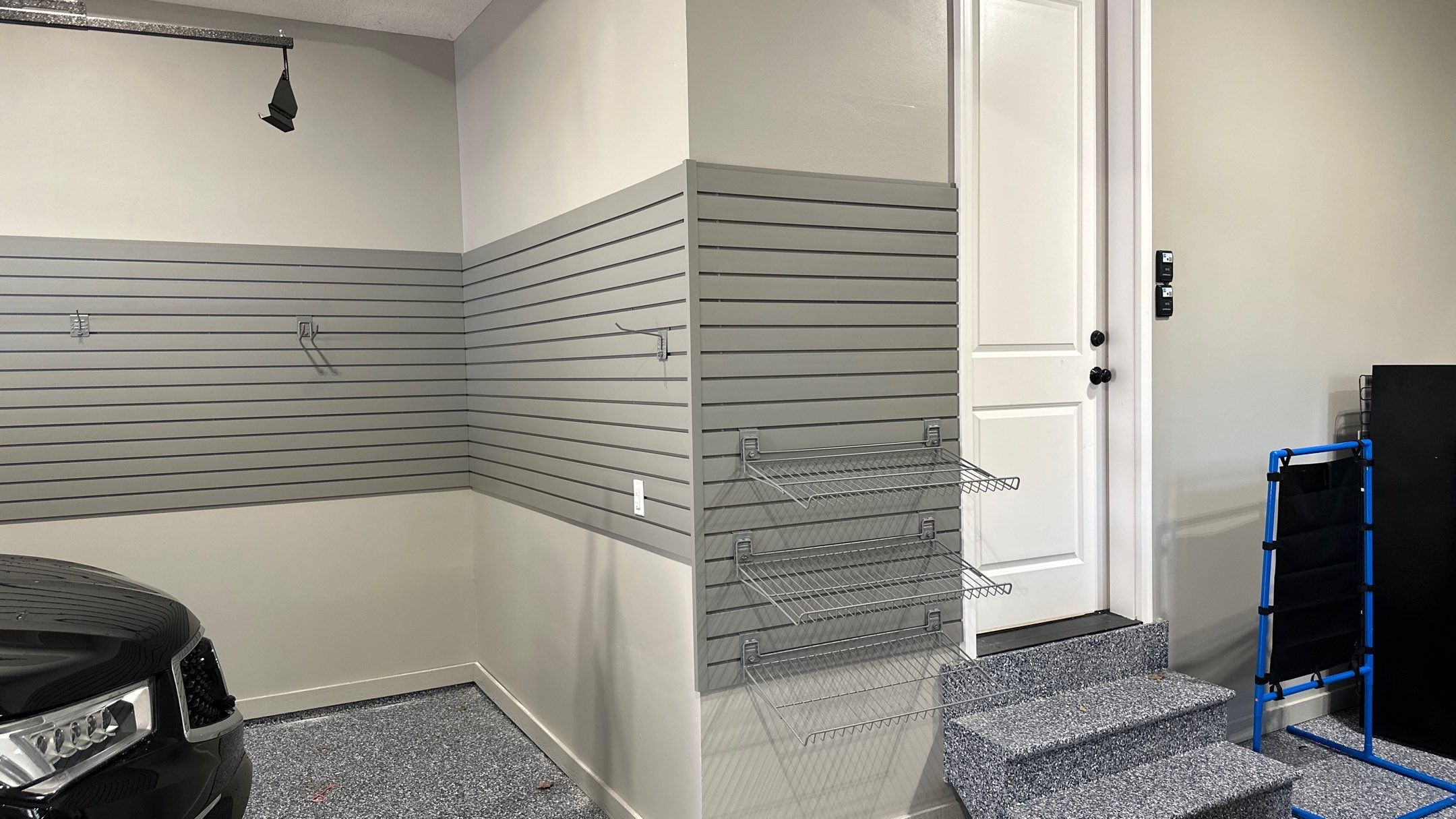 Matt F. added cabinets and slotwall to his garage by Banner Garage