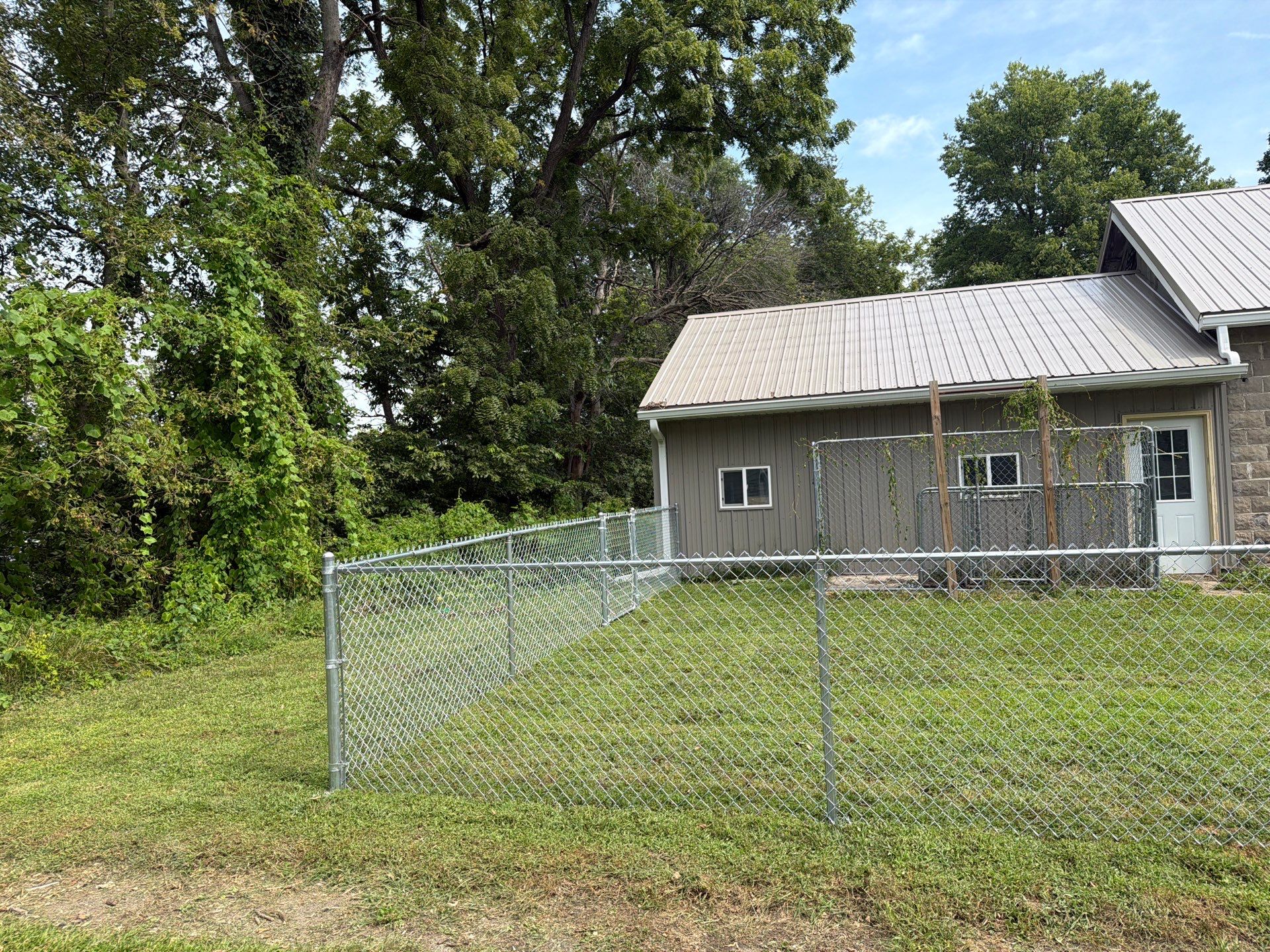 Galvanized Chain Link Fence and Gate Installation in La Porte City by Perfect Picket Fence and Stain