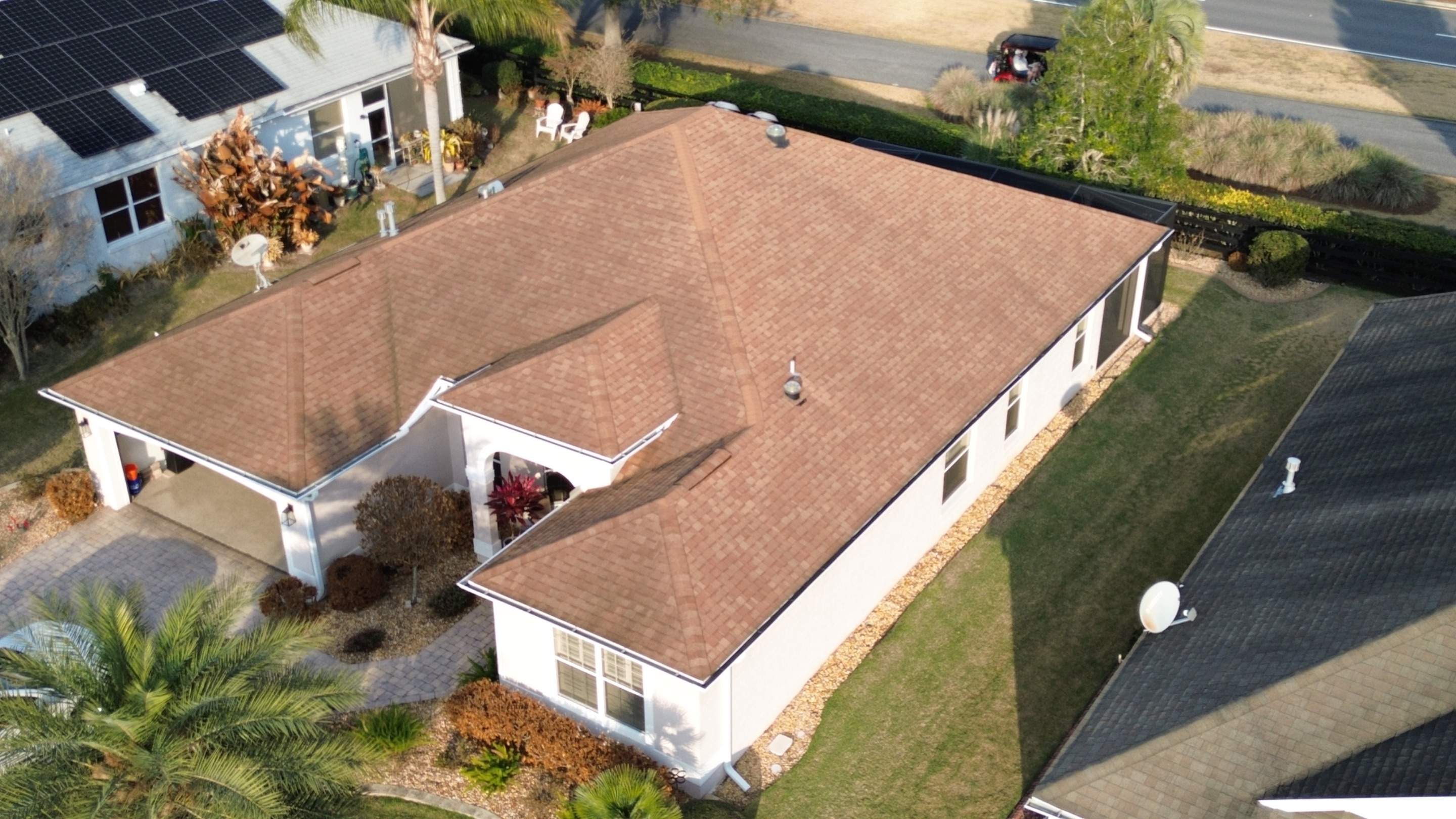 Before and after drone pictures in The Villages FL by Gold Key Roofing