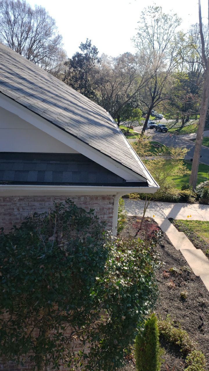 Gutter Cleaning using water by Power Wash Masters LLC
