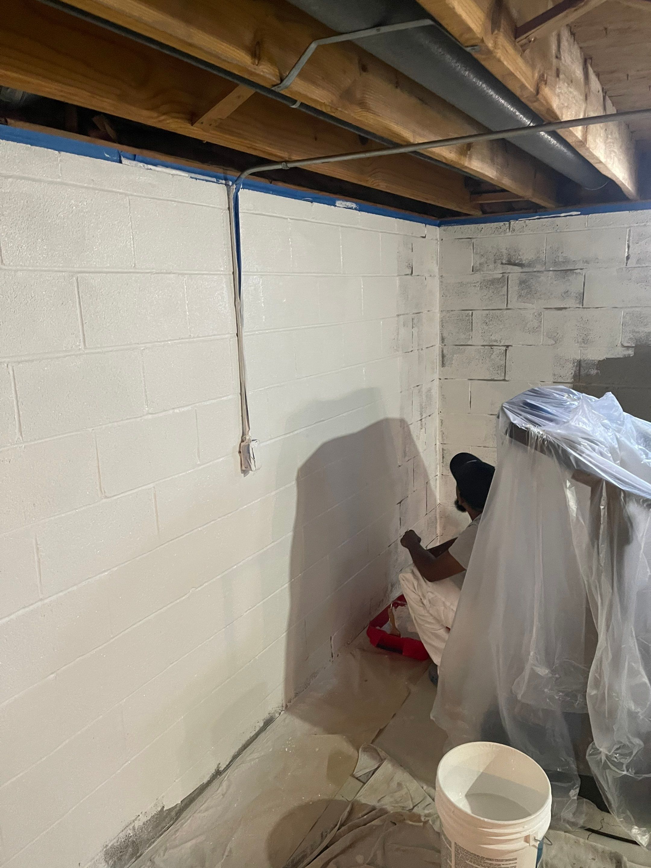 Flooring Installation and Basement Wall Painting using DryLok Extreme by Callaway Contracting LLC