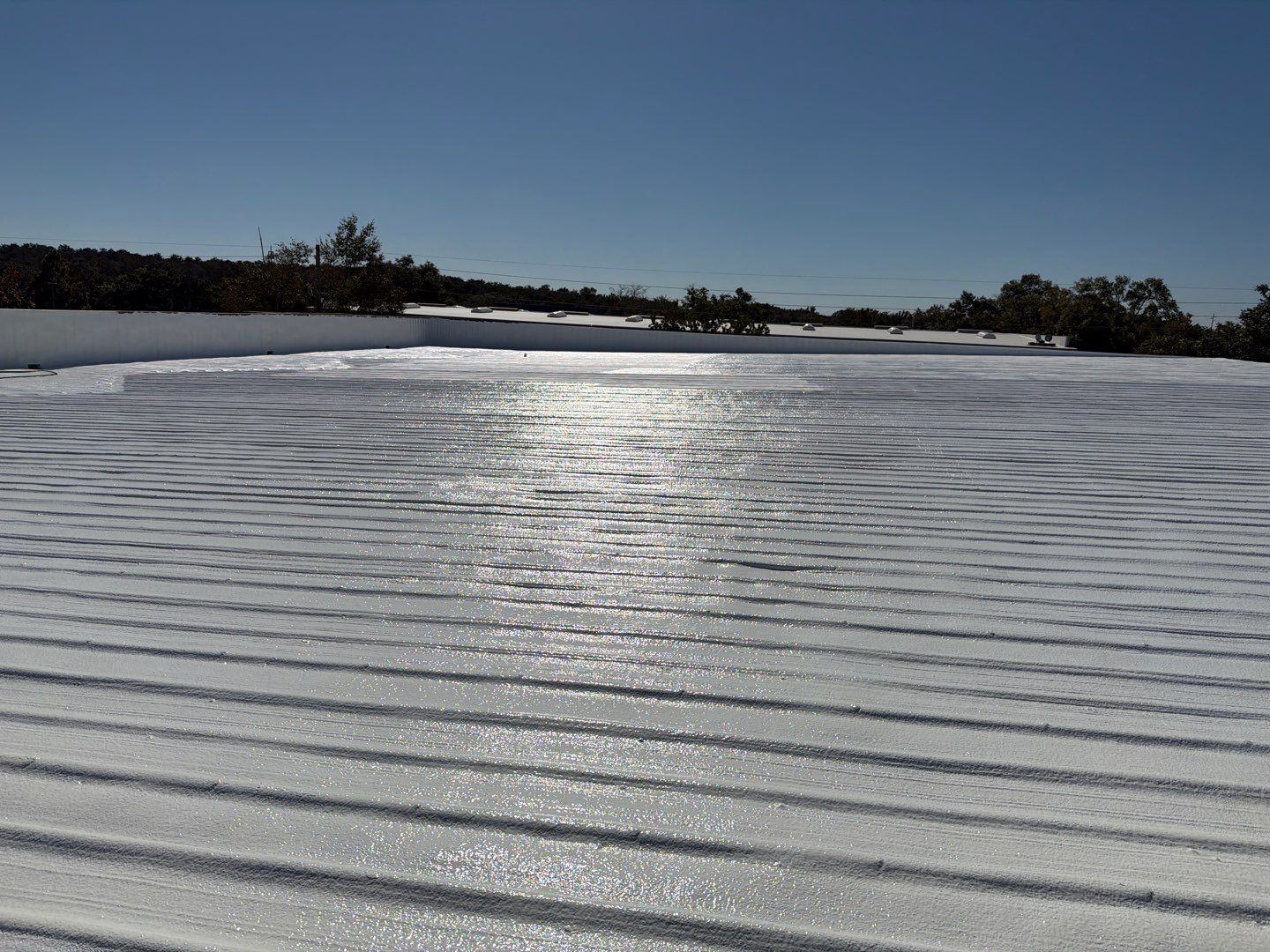 Orlando Commercial Metal Roof Restoration and Silicone Coating System by CES Roofing