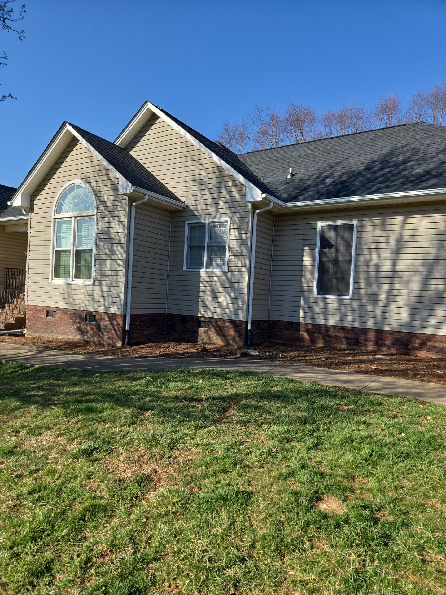 House Wash using cleaner by Power Wash Masters LLC
