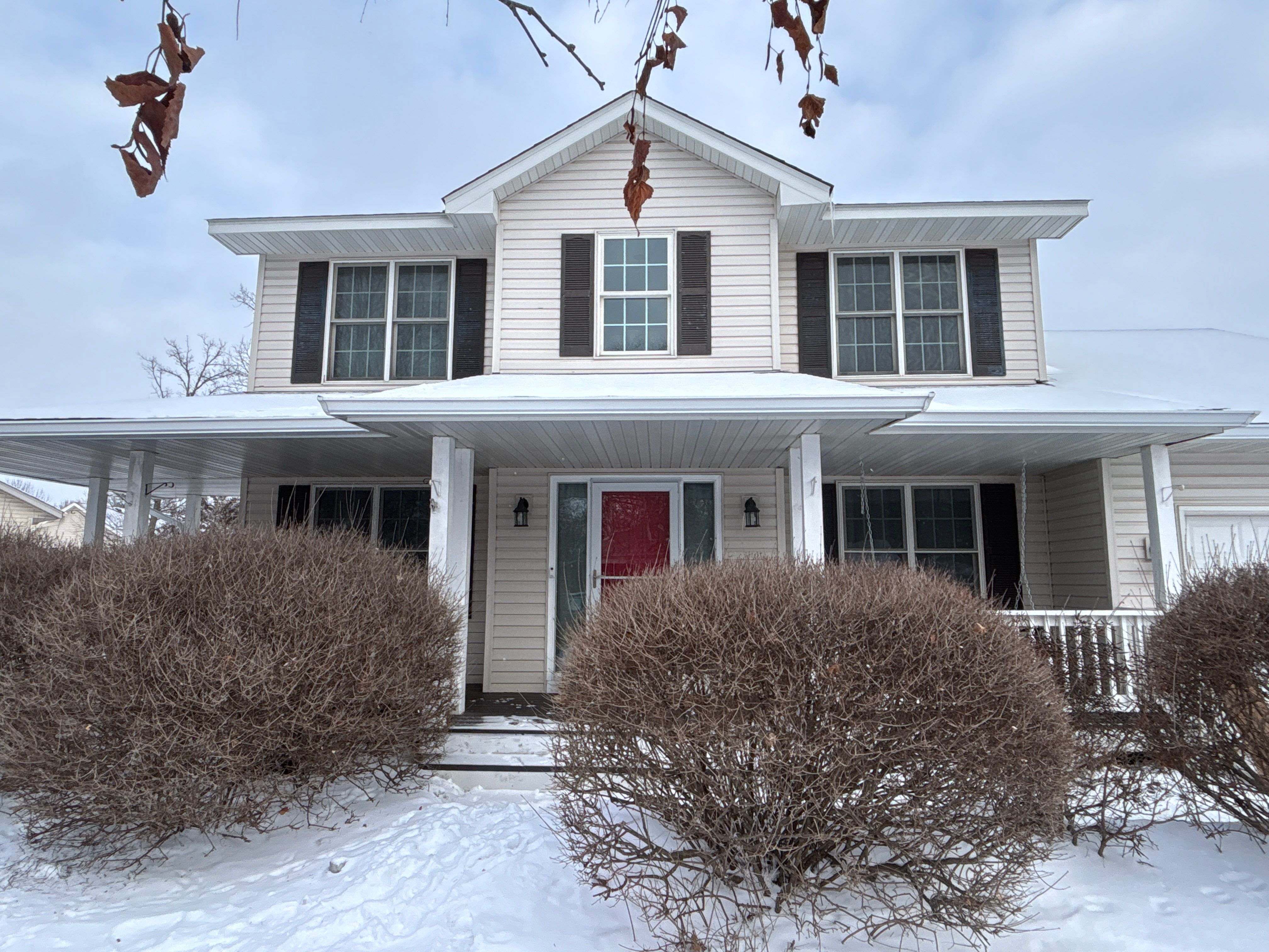 White Seamless Gutter and Downspout Installation in Big Lake by Next Level Seamless Gutters / Exteriors Inc.