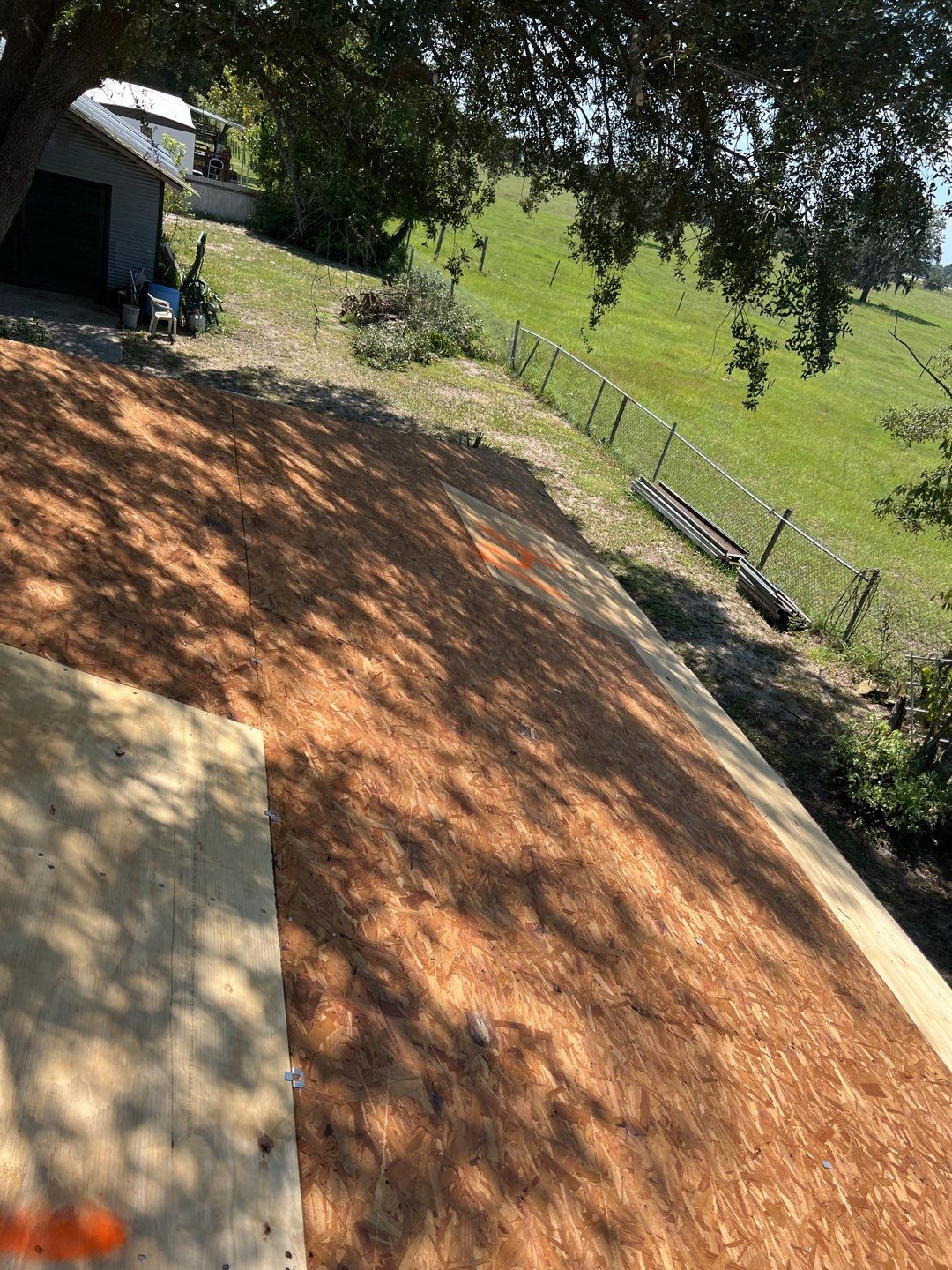 Residential Roofing Installation using 26 GA Rib Panel Galvalume by 1st Class Roofing, Inc.