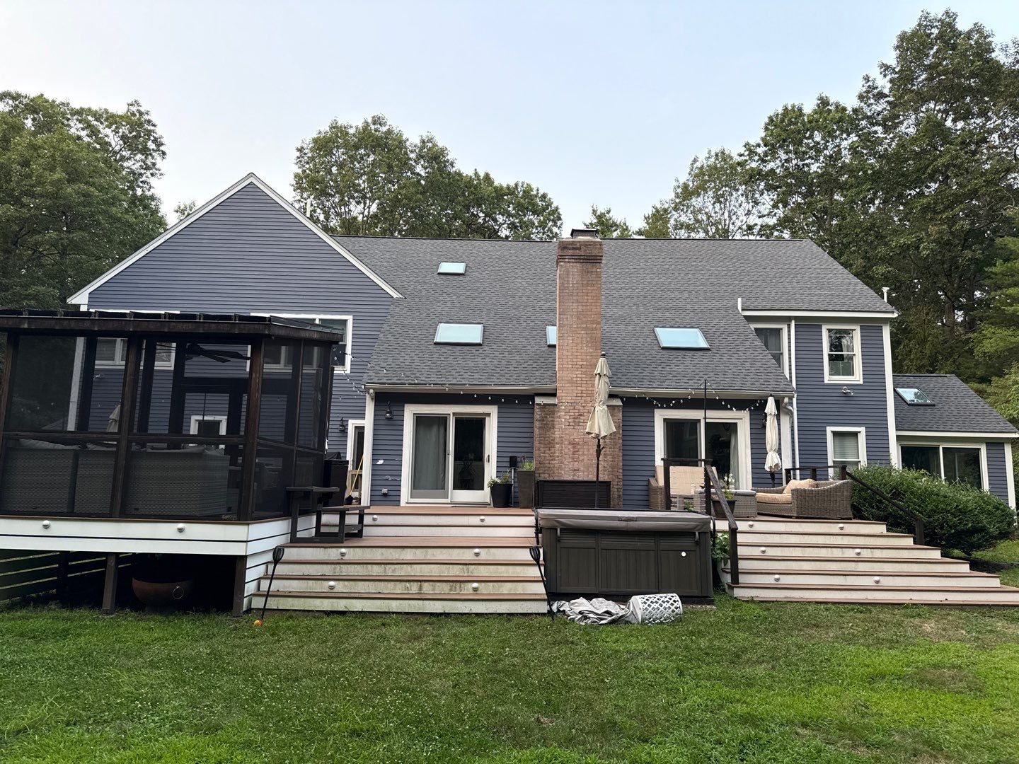 Solar-Ready Roof Replacement with GAF Pewter Gray Shingles & VELUX Skylights by Sensible Home Solutions