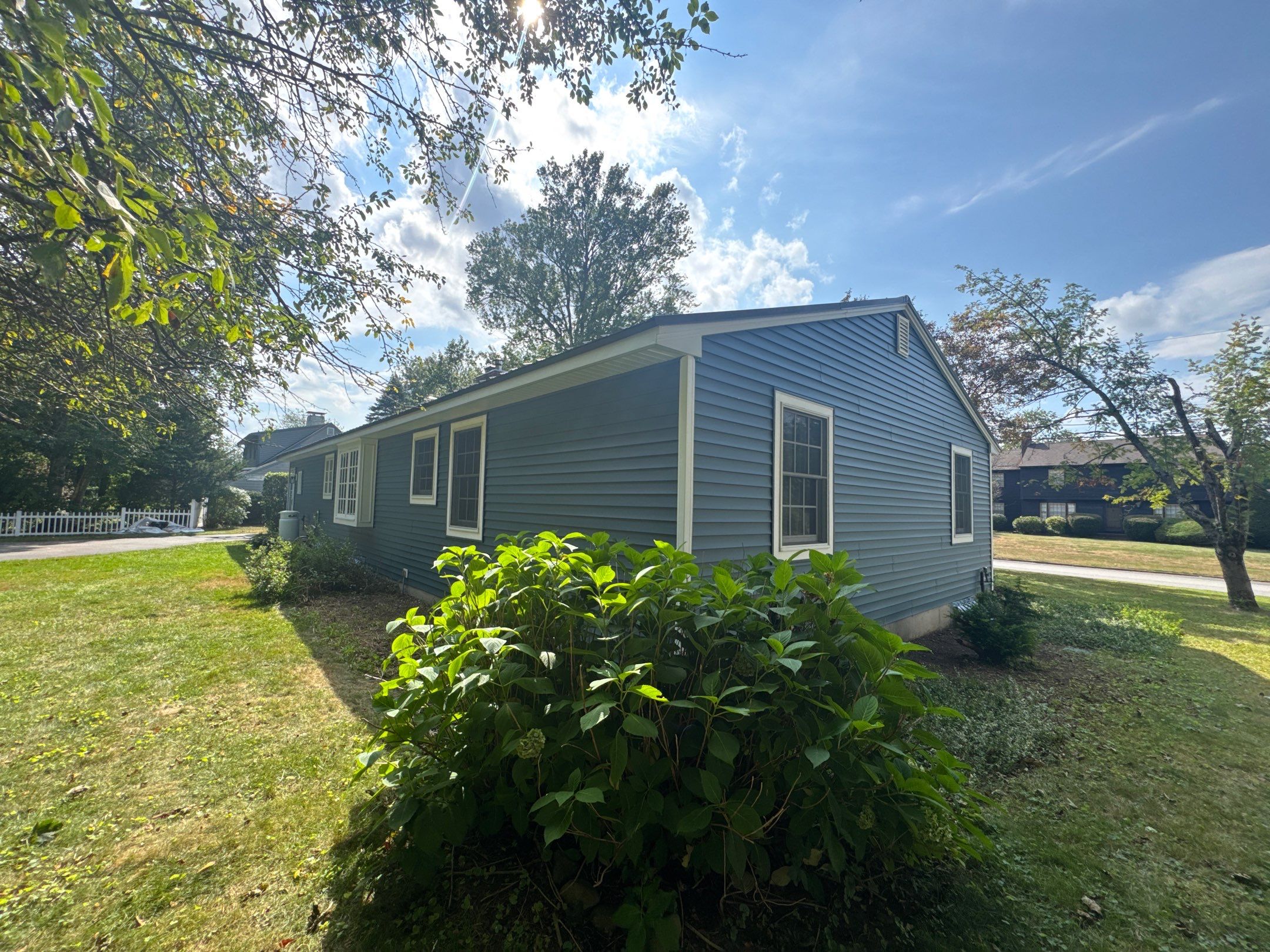 Vinyl Siding Replacement and Extensive Rot Repair on a Ranch Home in North Hampton, NH — additional view by Compass Exteriors