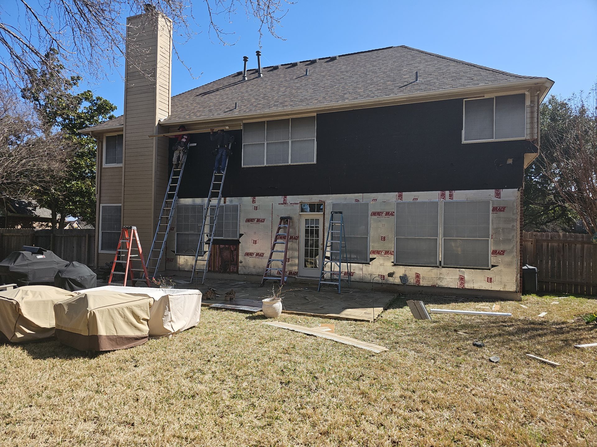 New Hardie Lap Siding & Board and Batten by DeZign Roofing & Exteriors