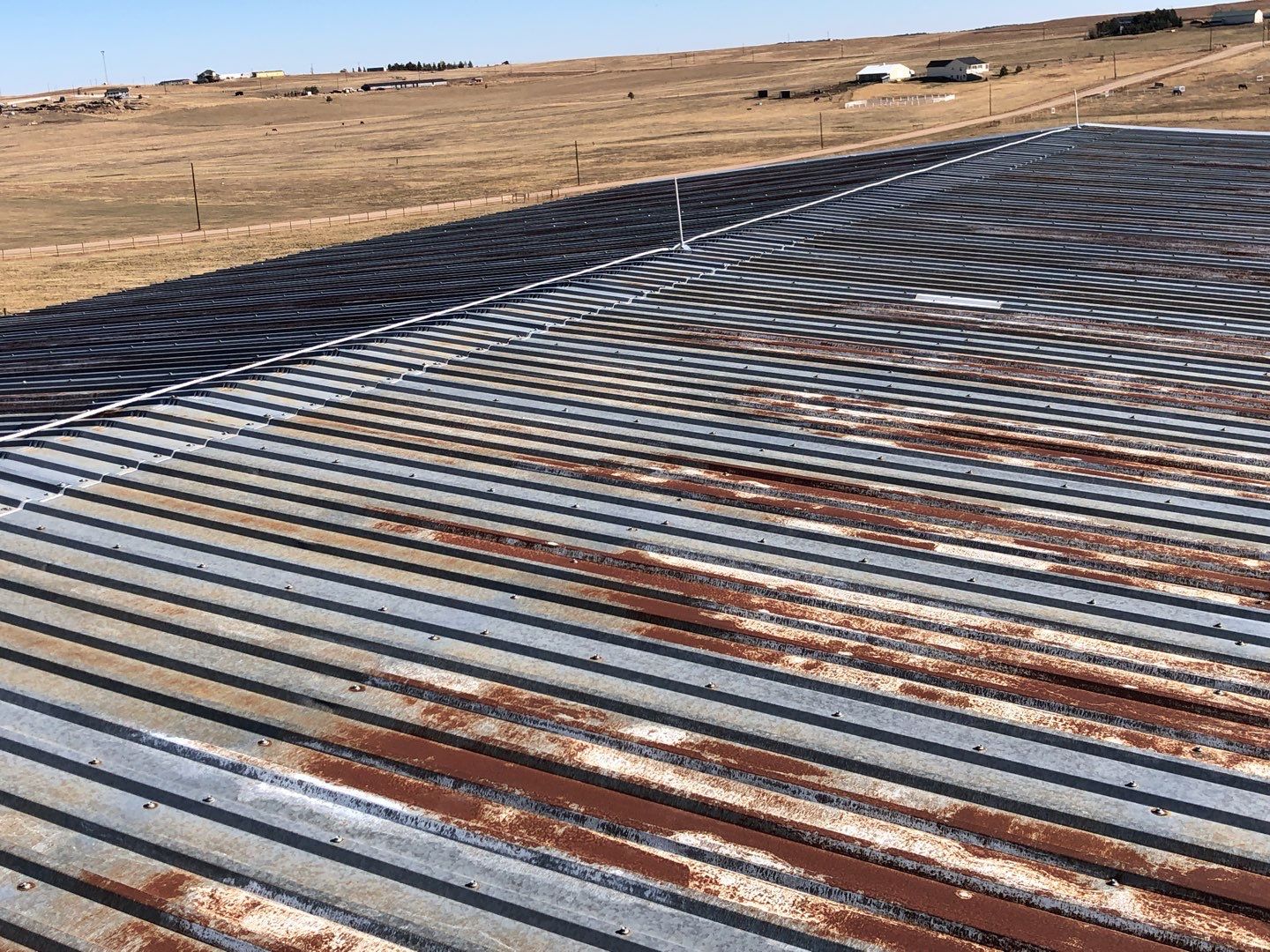 Residential Roofing Installation using Metal roofing by American Roofing & Construction LLC