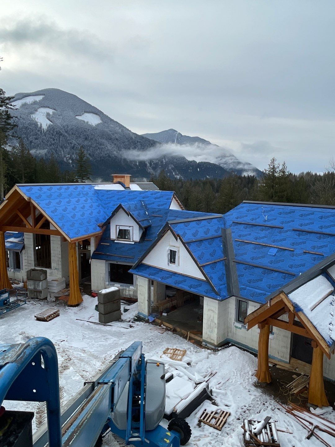 Residential Roofing Installation using 12" Prolok metal by Top Notch Roofing Inc