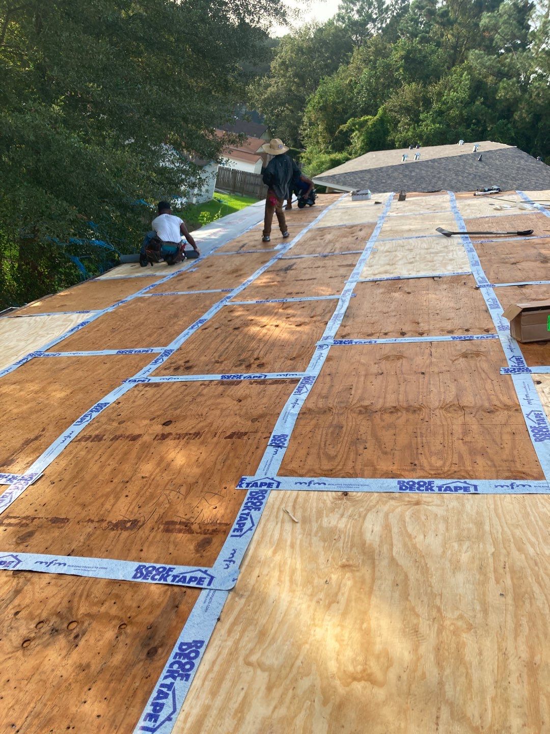 Residential Roofing Installation using Roof Replacement by American Roofing & Construction LLC