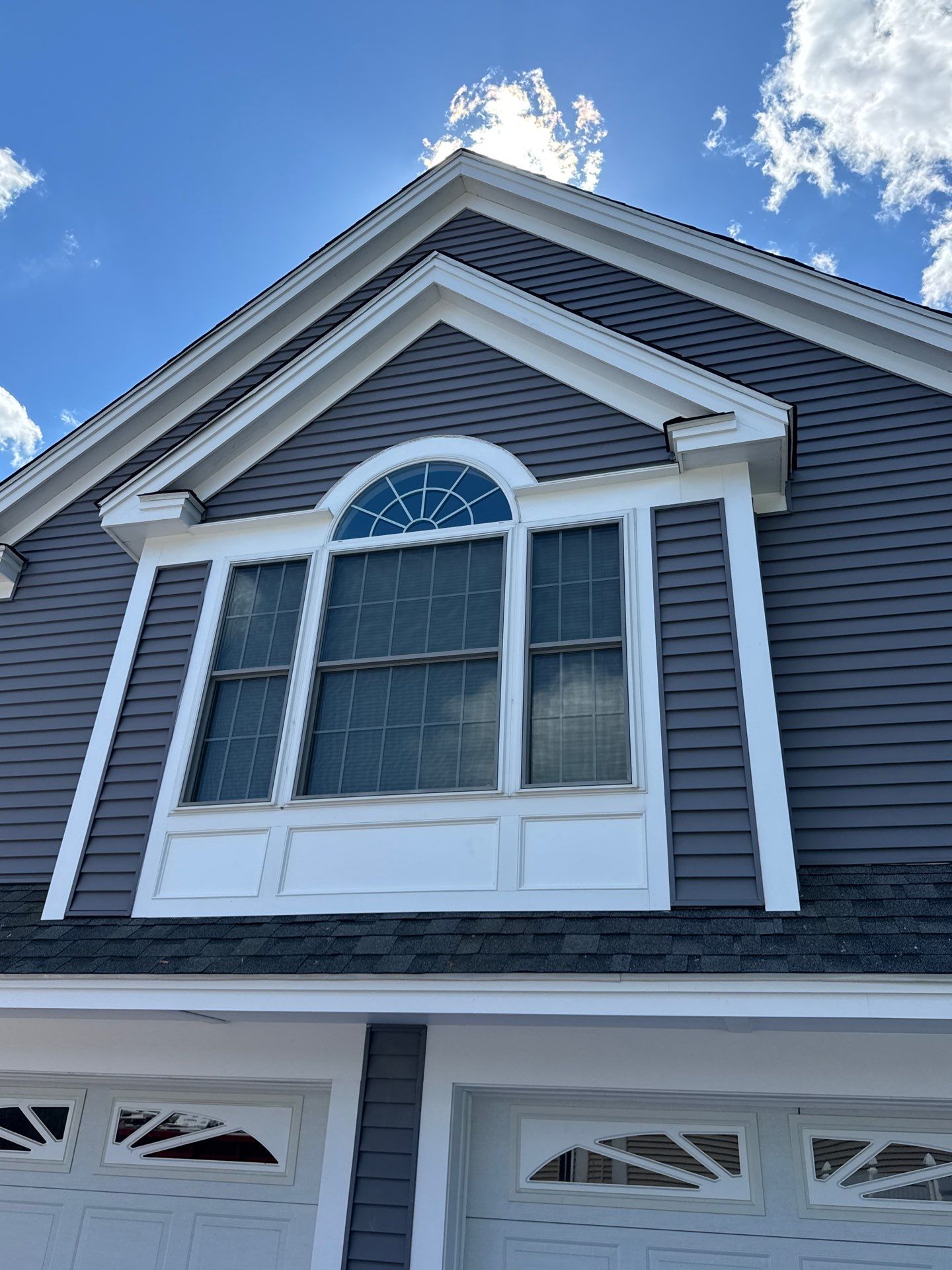 Roof, Trim, Deck, and Gutter Restoration by Mighty Dog Roofing of Greater Middlesex County
