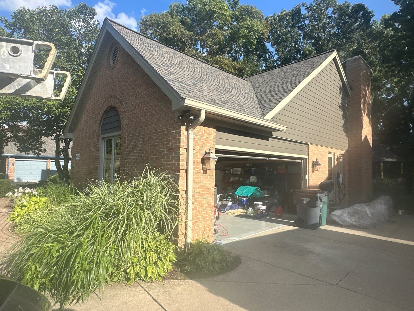 Roof Replacement using Owens Corning Peppercorn and Siding Replacement using Ascend Charcoal Smoke by 180 Contractors