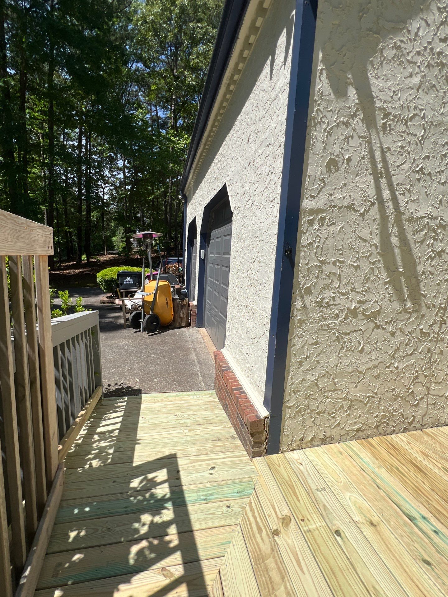 Pressure-Treated Wood Deck Resurfacing and Staircase Reconstruction in Canton by Swift Home Renovations