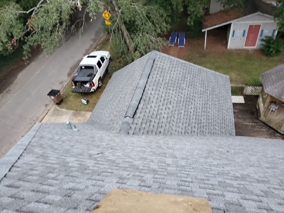 Residential Roofing Installation using Roof Replacement by American Roofing & Construction LLC