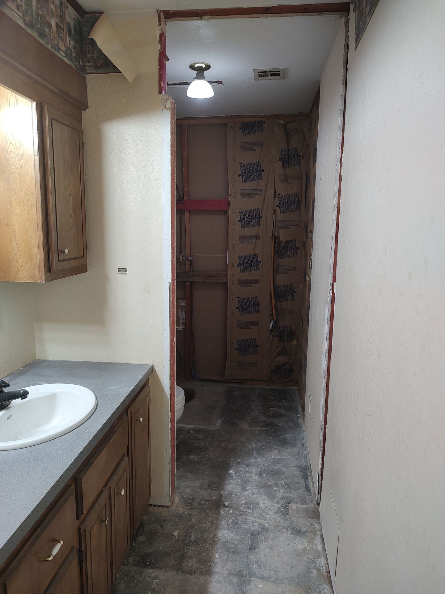 Bathroom remodel w/shower upgrade by In & Out Construction & Remodeling, LLC