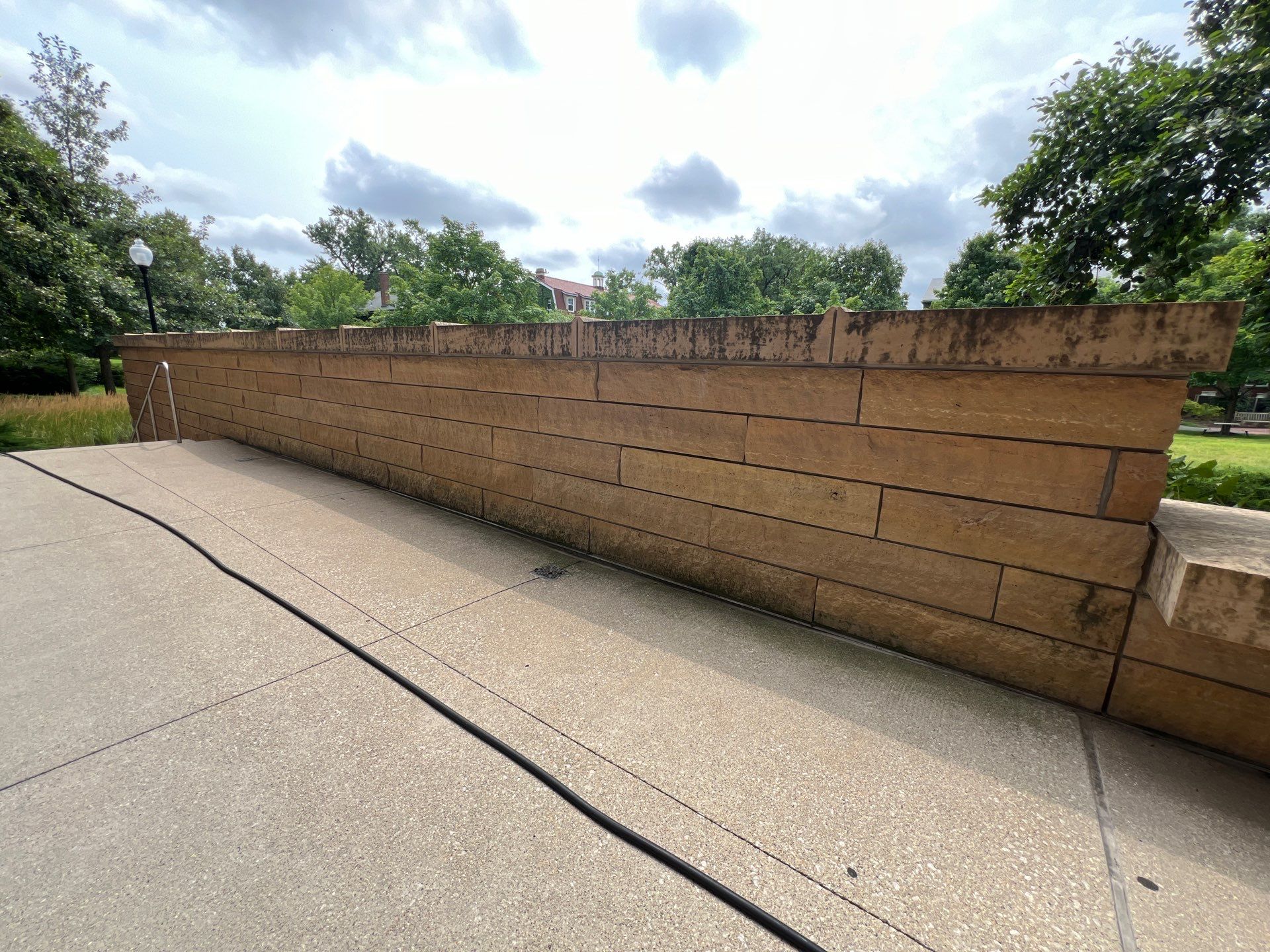 natural stone using Algaecide, soft wash soap by Northern Power Washing LLC.