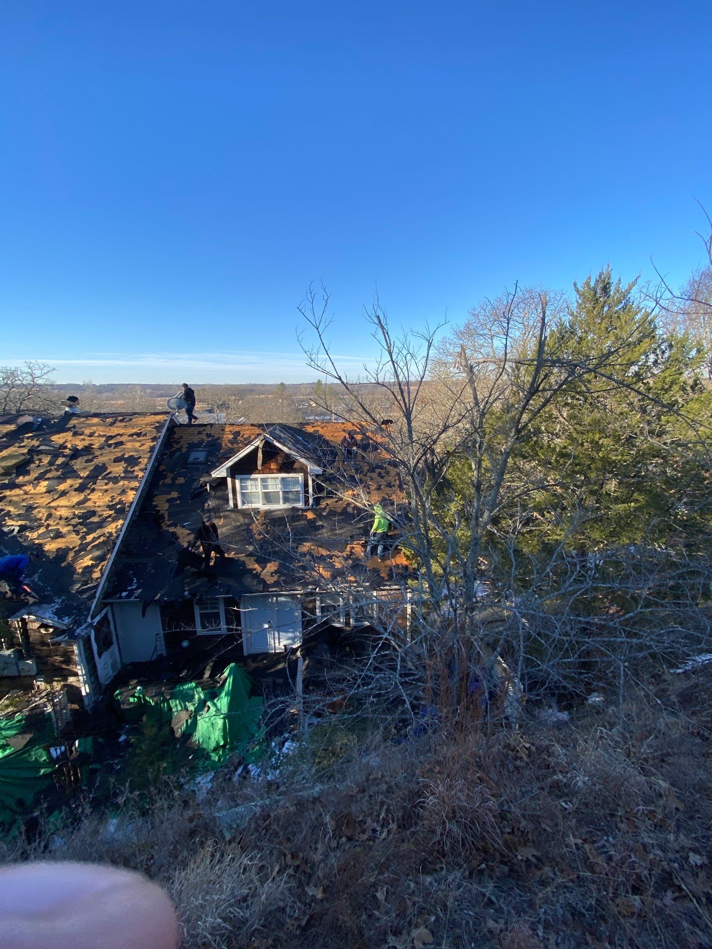 Roof Replacement on a private lake near Ardmore by BANA Roofing and Solar Supply