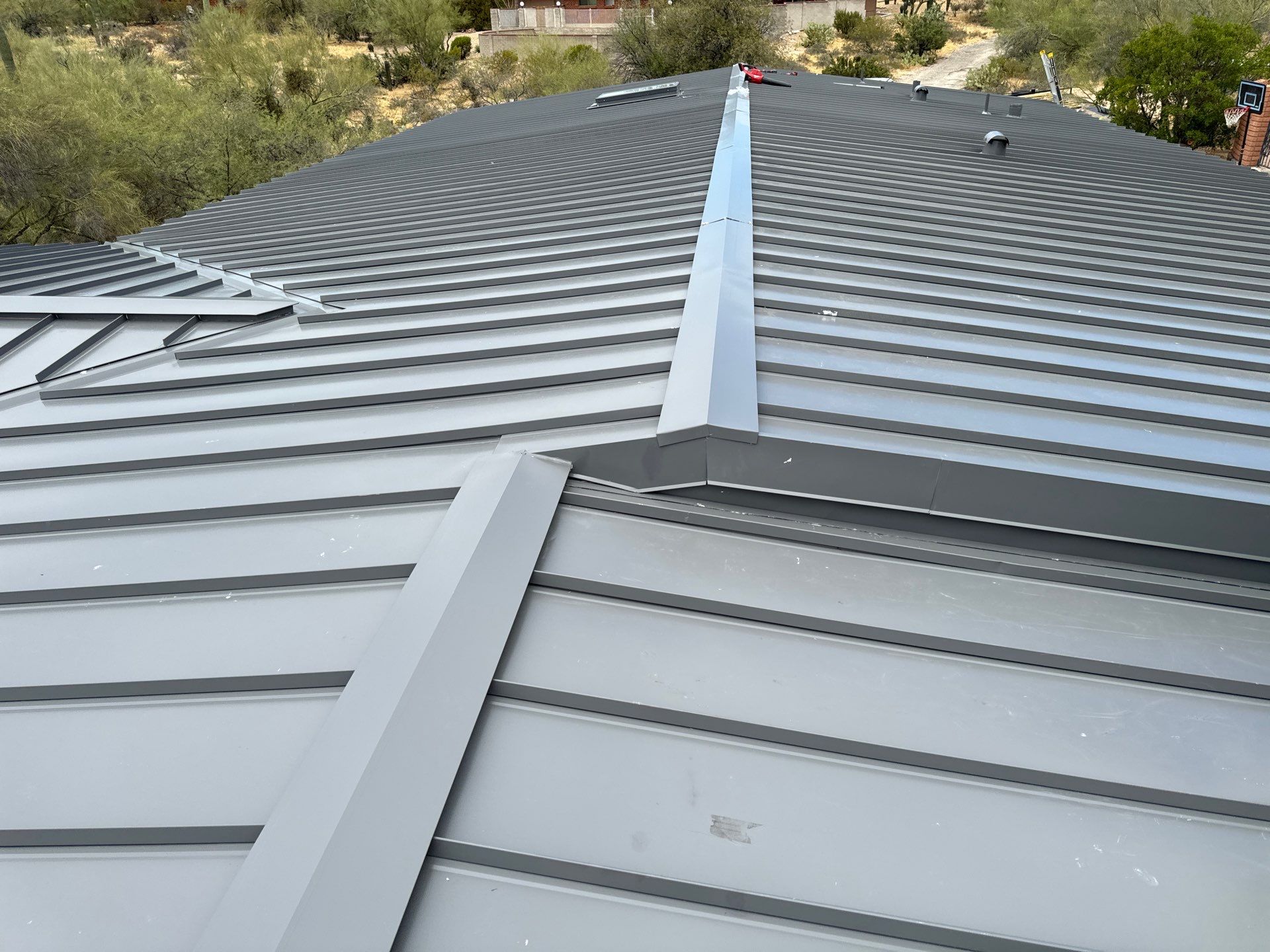 Charcoal Gray Standing Seam by Reimagine Roofing