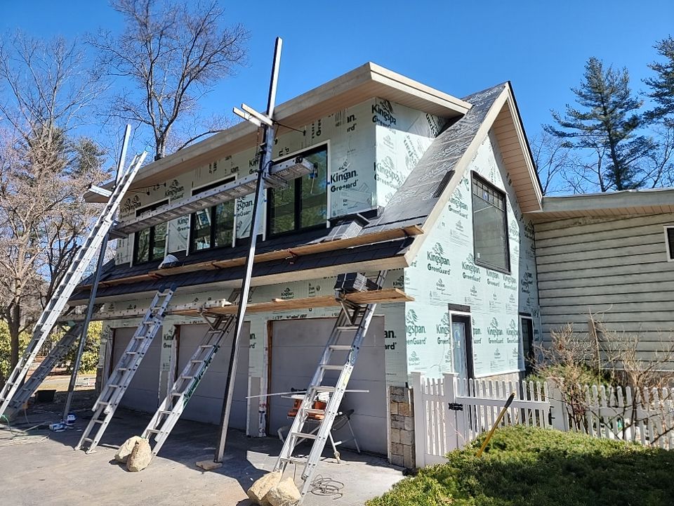 Siding in Weston,  MA by UBrothers Construction