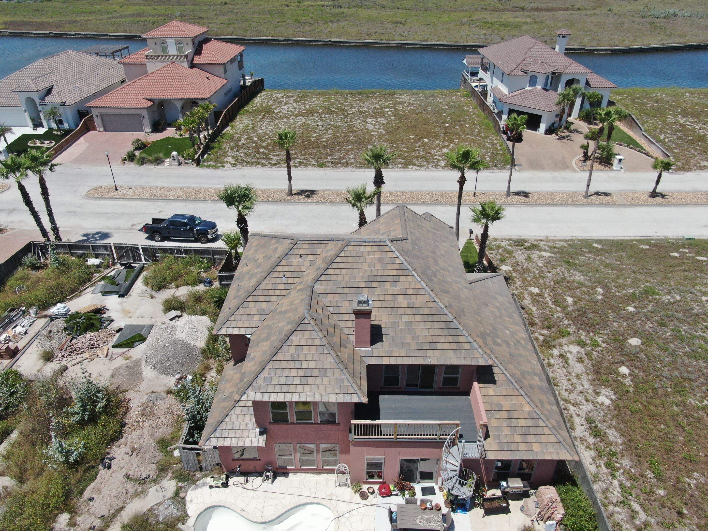 Busted to Beautiful! by Bayfront Roofing and Construction