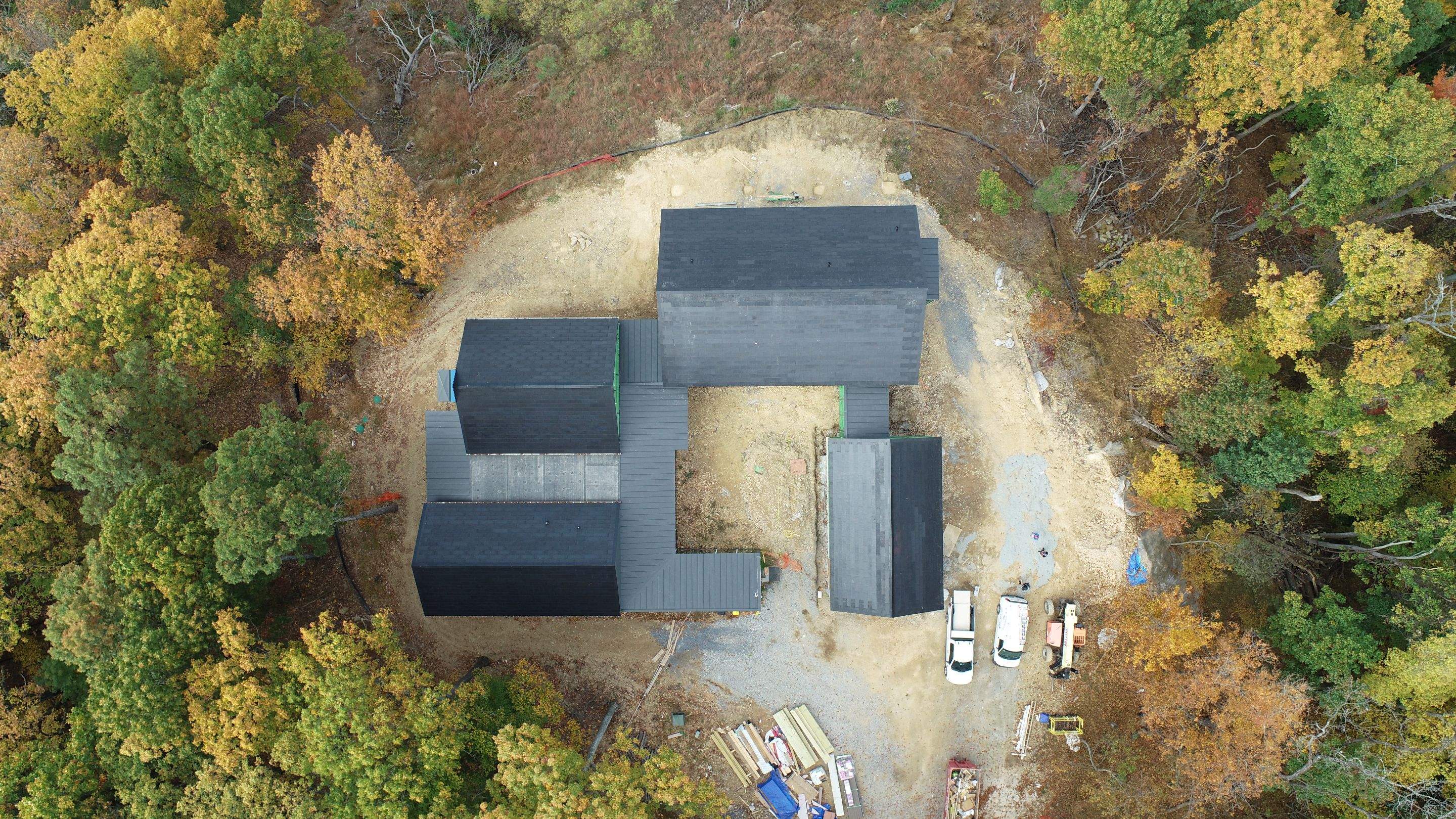 Roof Installation using Tesla Solar Roof V3 by American Home Contractors