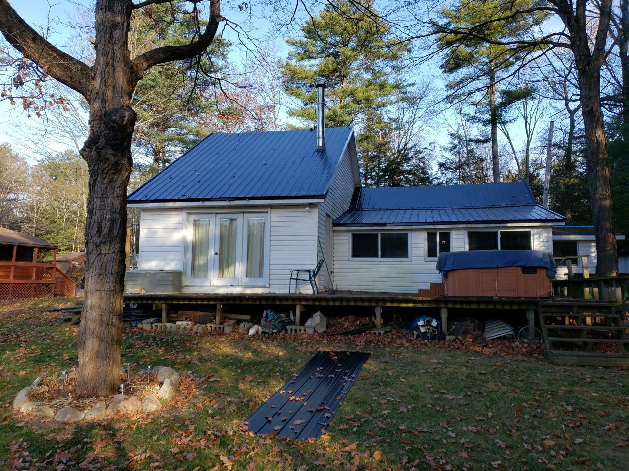 Exposed Fastener Metal Roof using Vicwest UltraVic by Jay Carter Roofing & Sheet Metal