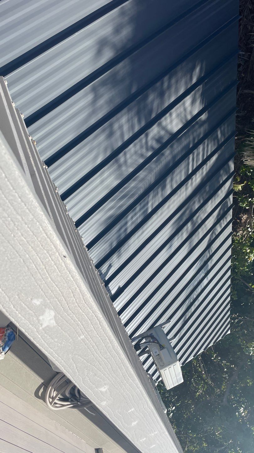 Residential Roofing Installation using Gulf Coast Metals Gulf Seam Panels by Four Peaks Roofing