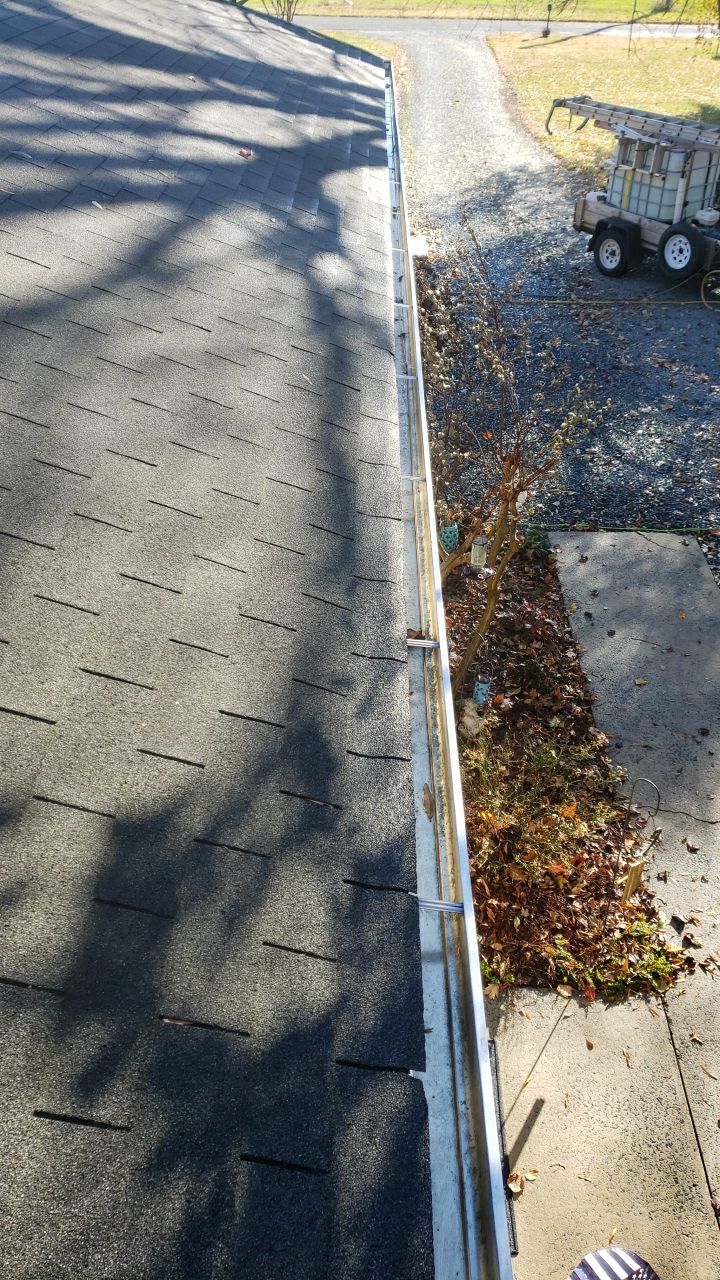 gutter cleaning and house wash and gutter guard installation by Power Wash Masters LLC