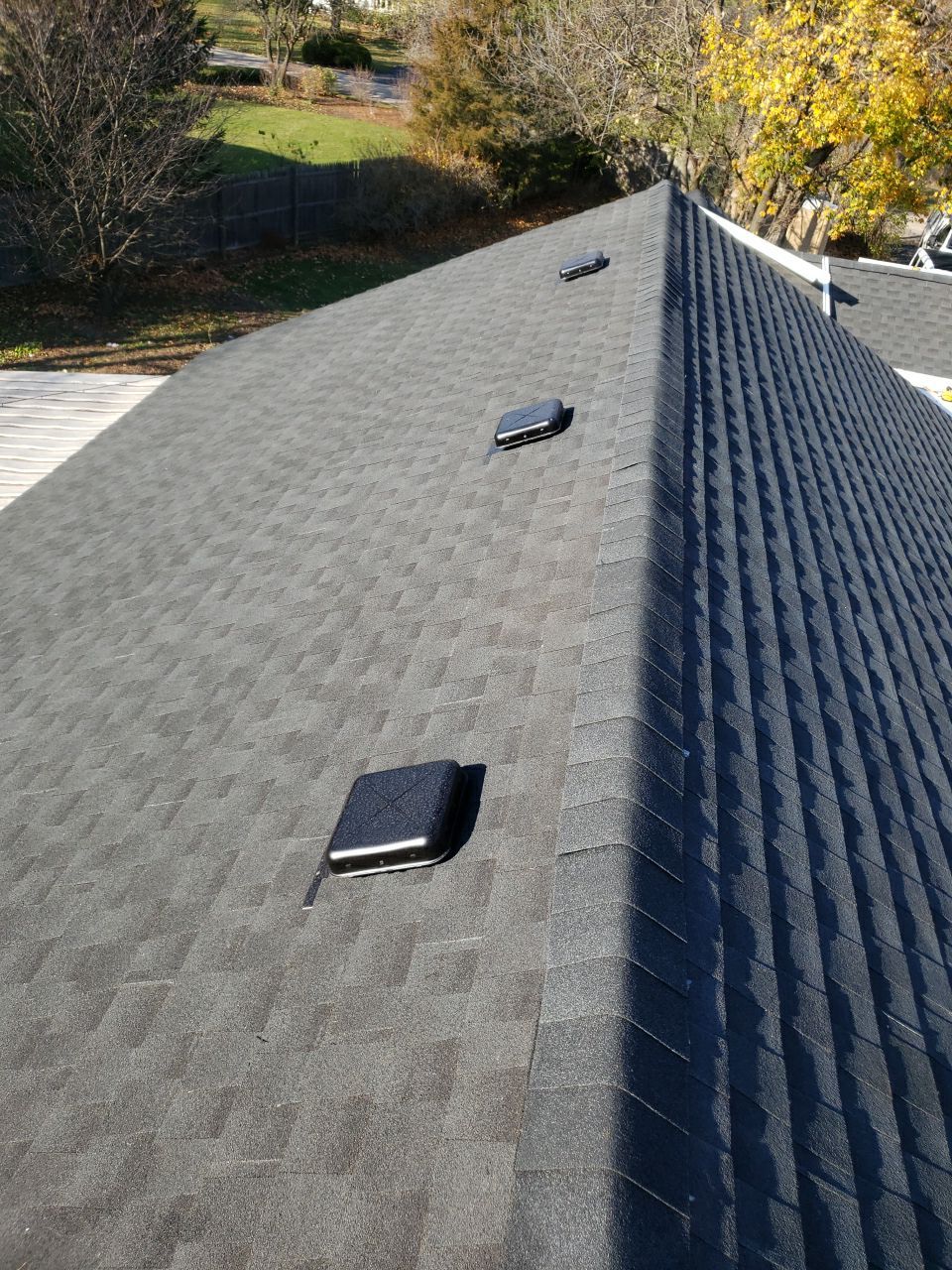 Asphalt Roof Replacement by Custom Installations