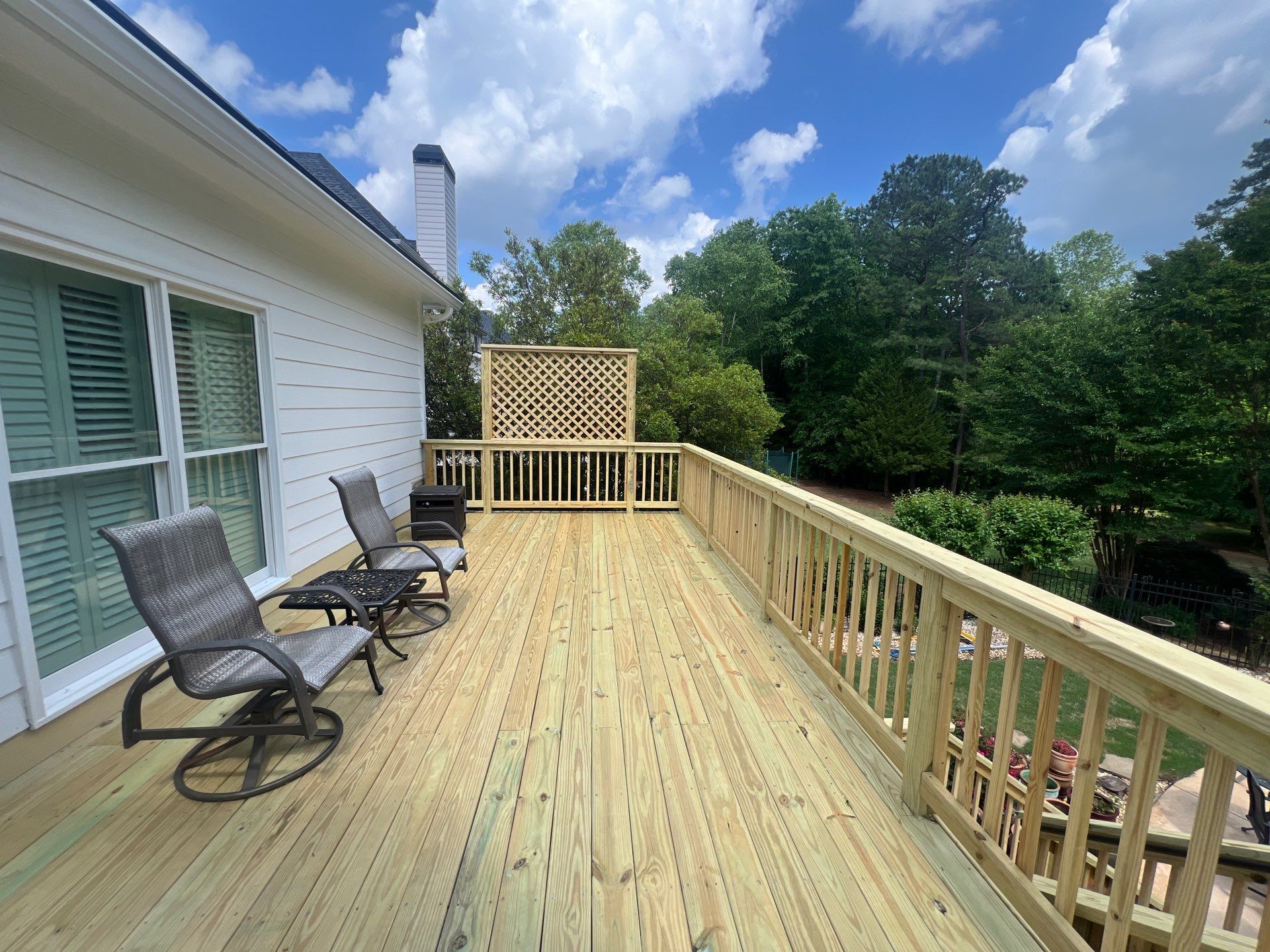 Multi-Level Pressure-Treated Wood Deck and Screened Porch in Acworth by Swift Home Renovations