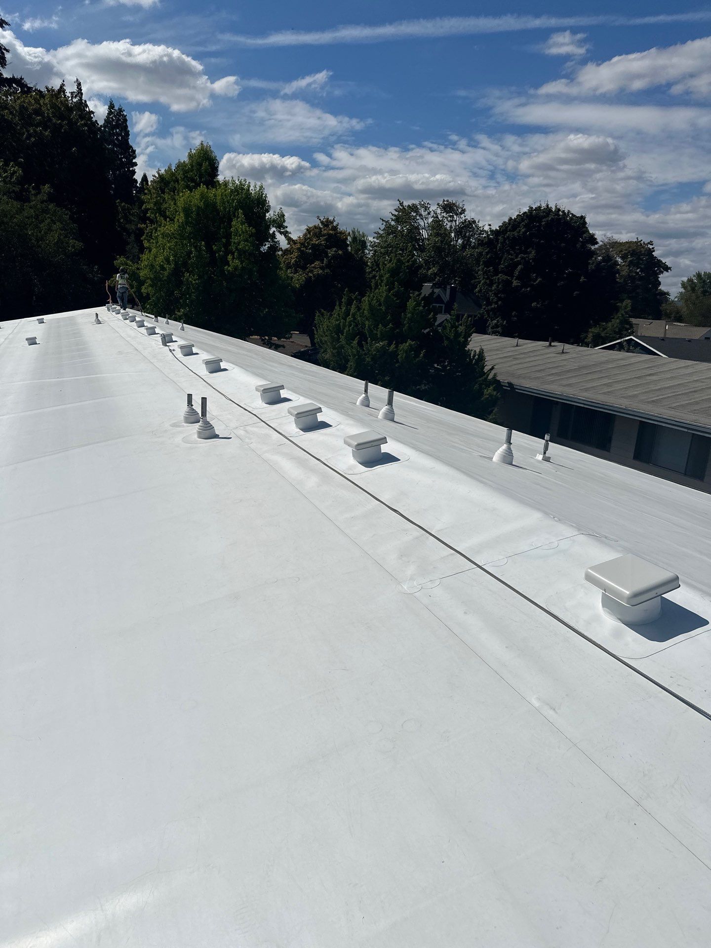 Commercial Flat Roof Installation using GAF 60Mil TPO  by Orezona Building & Roofing Company, Inc.