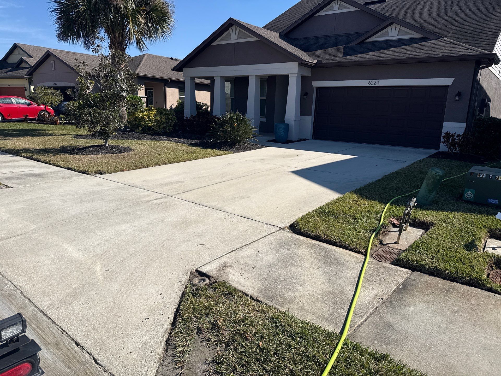 2-Car Concrete Driveway & Sidewalk Cleaning in Trevesta – Palmetto, FL by Sunshine AquaWash