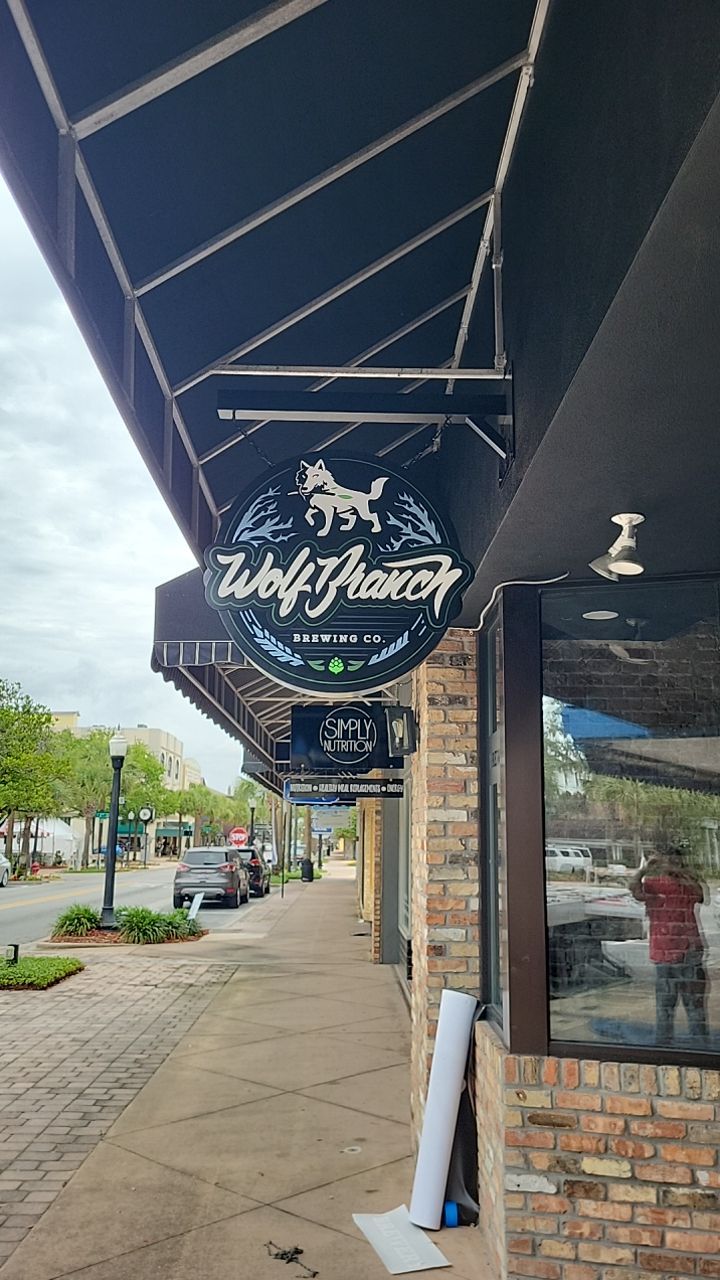 Channel Letters and Blade Sign for Wolf Branch Brewing by SignCrafters