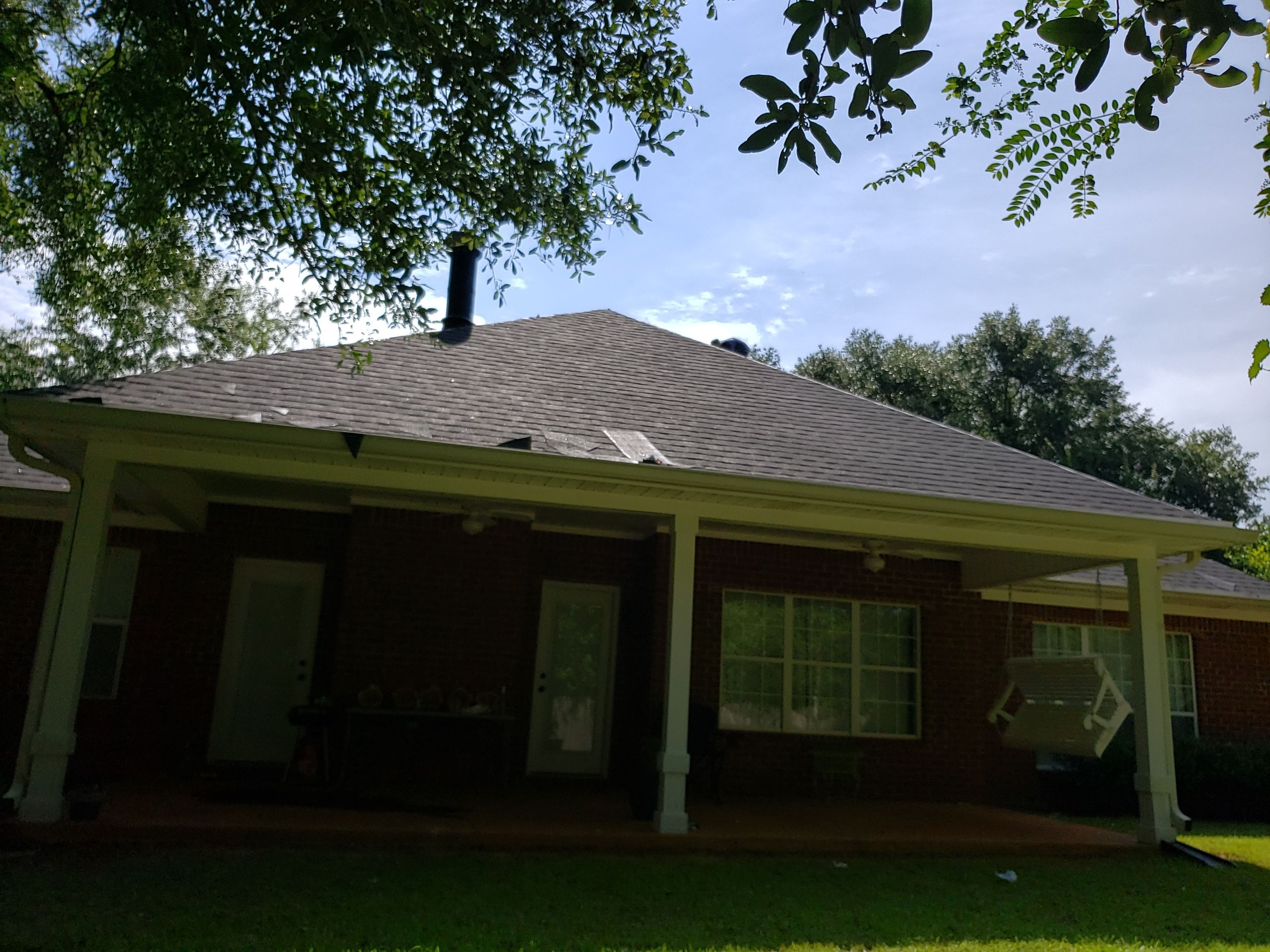 Residential Roofing Installation using Roof Replacement by American Roofing & Construction LLC