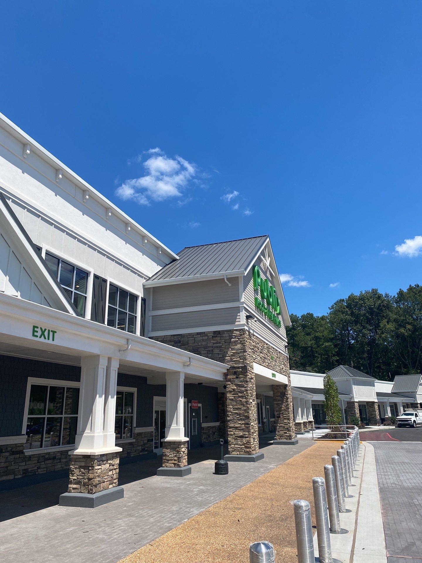 Commercial Roofing Installation using Berridge 11 1/2" Cee Lock .032 Aluminum Charcoal Grey by Infinity Metal Systems
