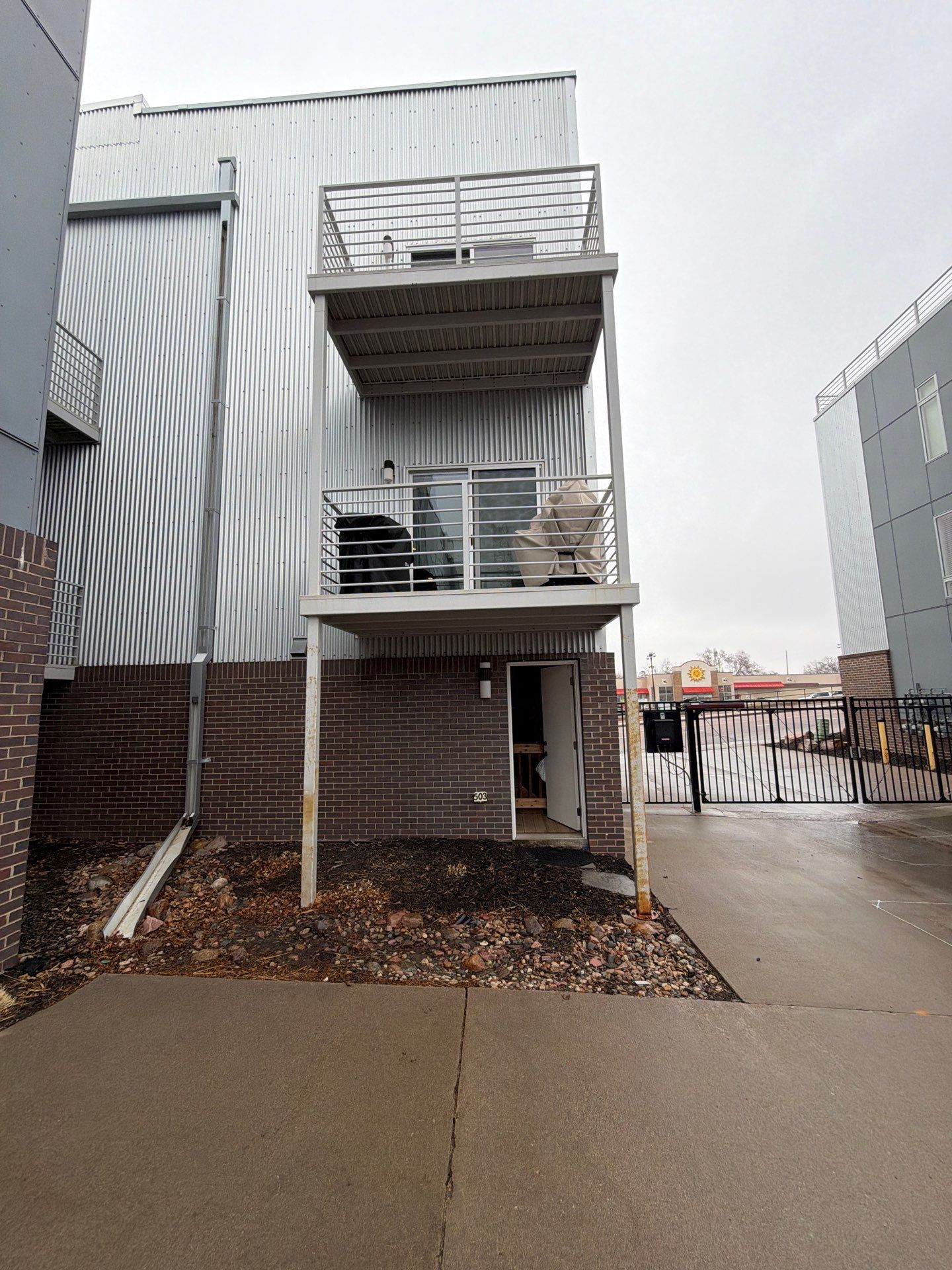 Modern Multi-Unit Exterior Painting and Siding Refresh in Sioux Falls by Select Painting, Coatings & Garage Cabinets