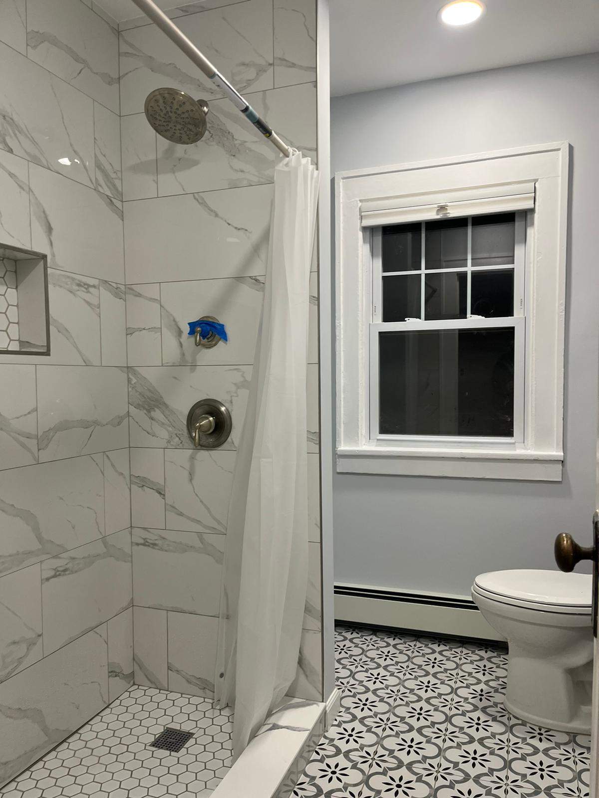 Bathroom Remodel using Tile by Home Concepts Construction