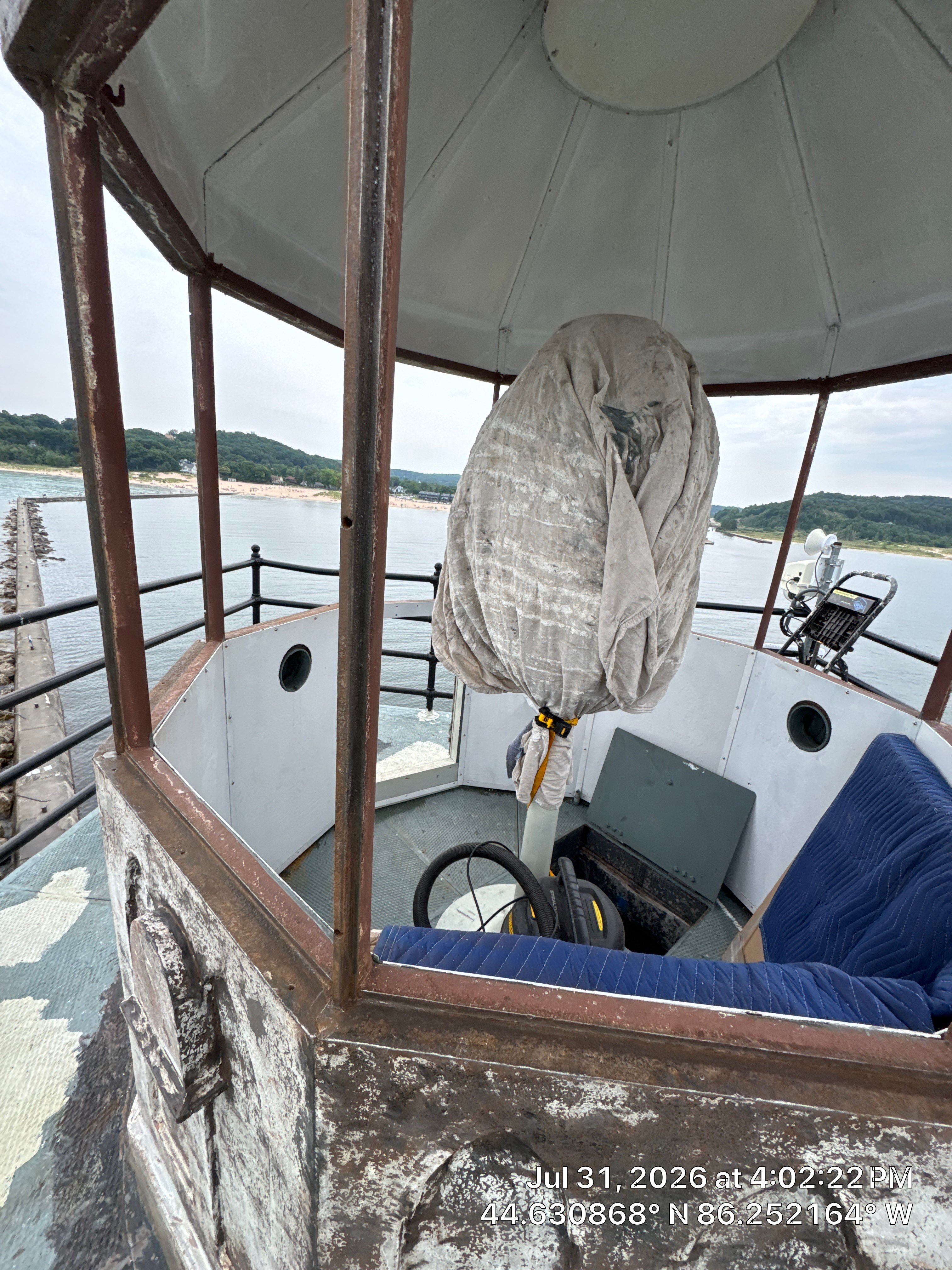 Historical Restoration and Coating of Frankfort North Breakwater Lighthouse by Finkle Preservation & Construction 