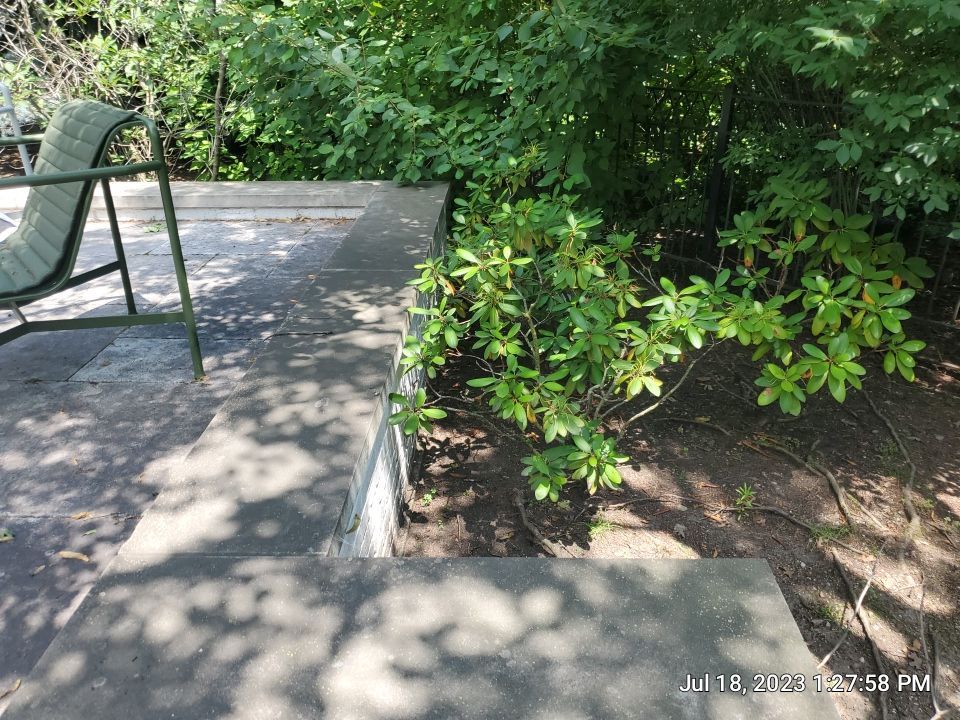 marble patio cleaning and sanding using Polysweep polymeric sand by Northern Power Washing LLC.