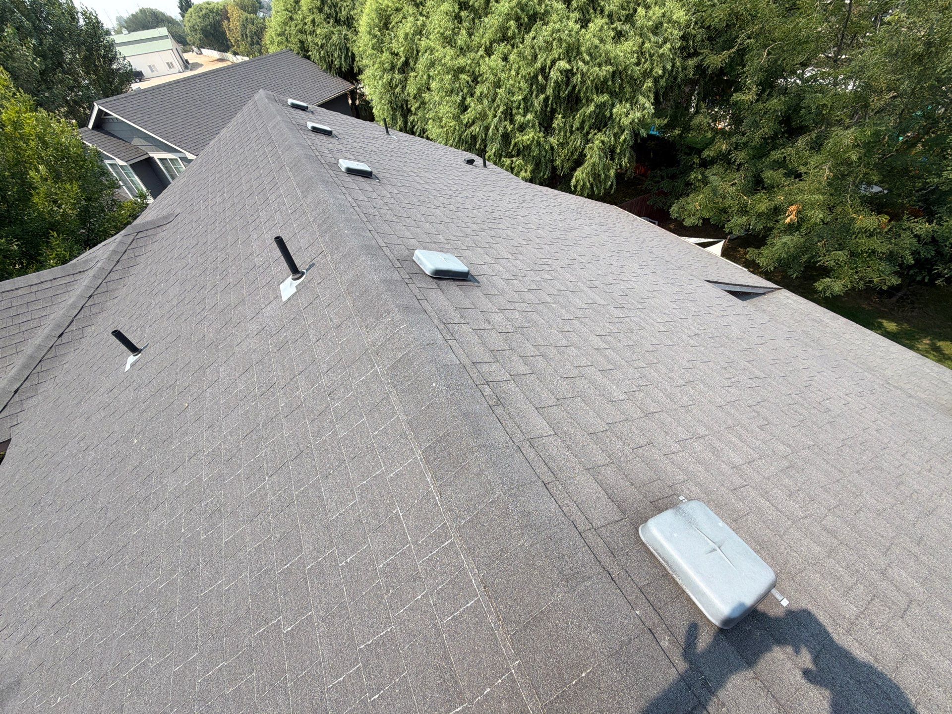 Residential Roof Replacement in Meridian Featuring Charcoal Architectural Shingles by Olive Roofing