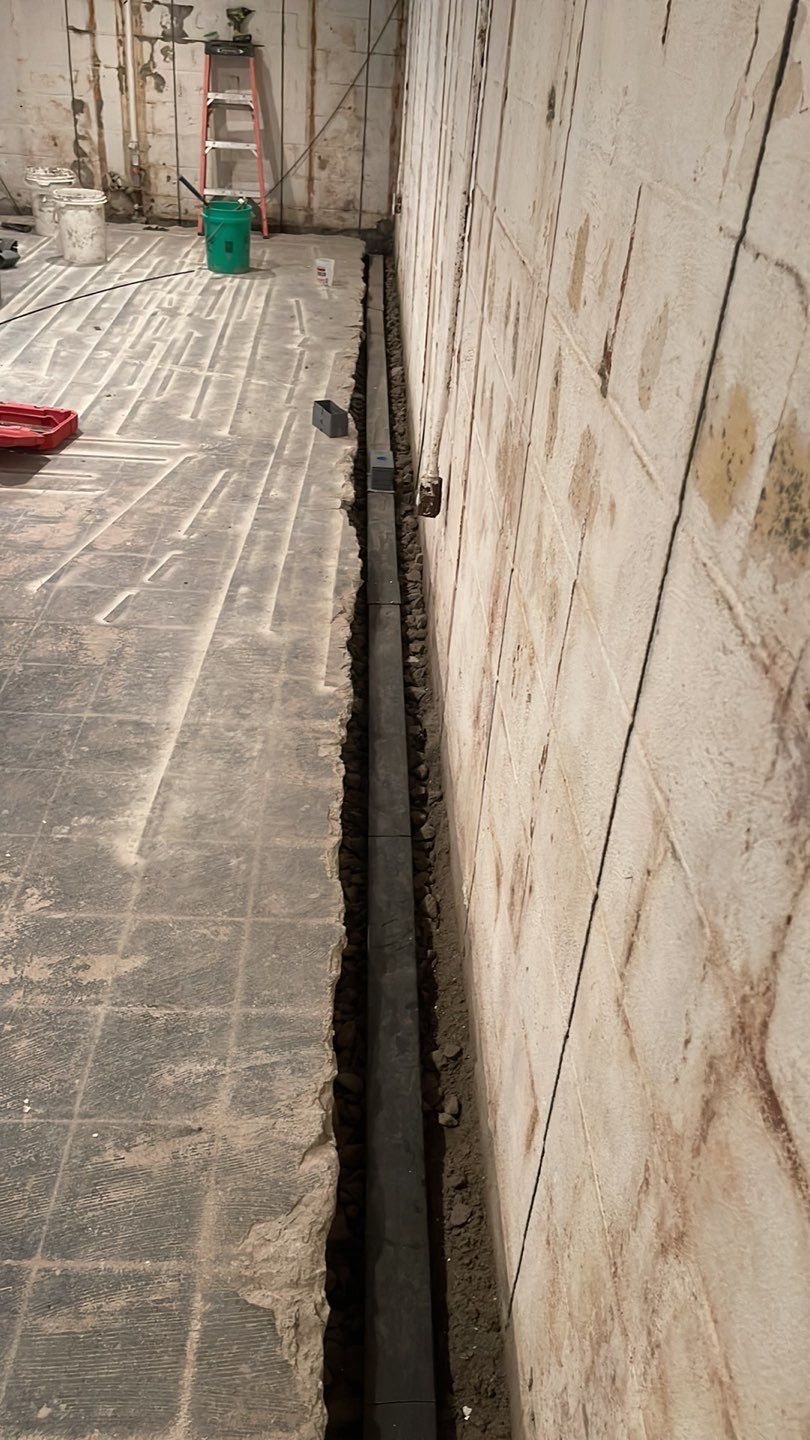 Embedded Fiber Reinforcement and Basement Waterproofing using GrateDrain Waterproofing System by Toledo Basement Repair