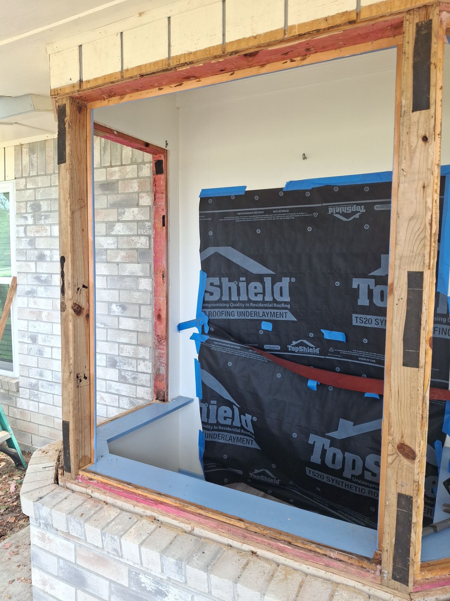 Installing Windows on a Submarine  by Bayfront Roofing and Construction