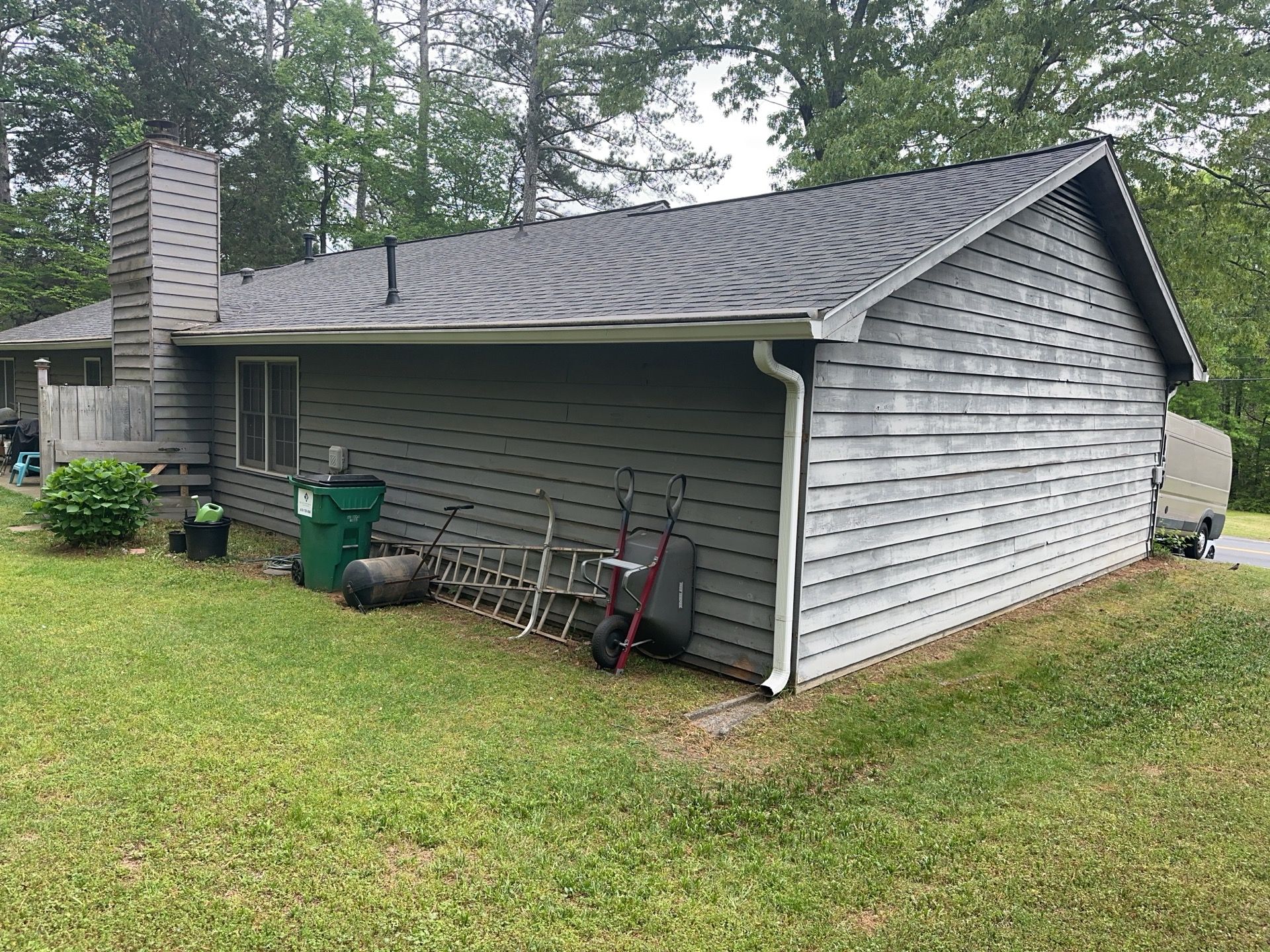 Marietta, GA Exterior Painting Transformation with Blue Paint by Nelson Exteriors