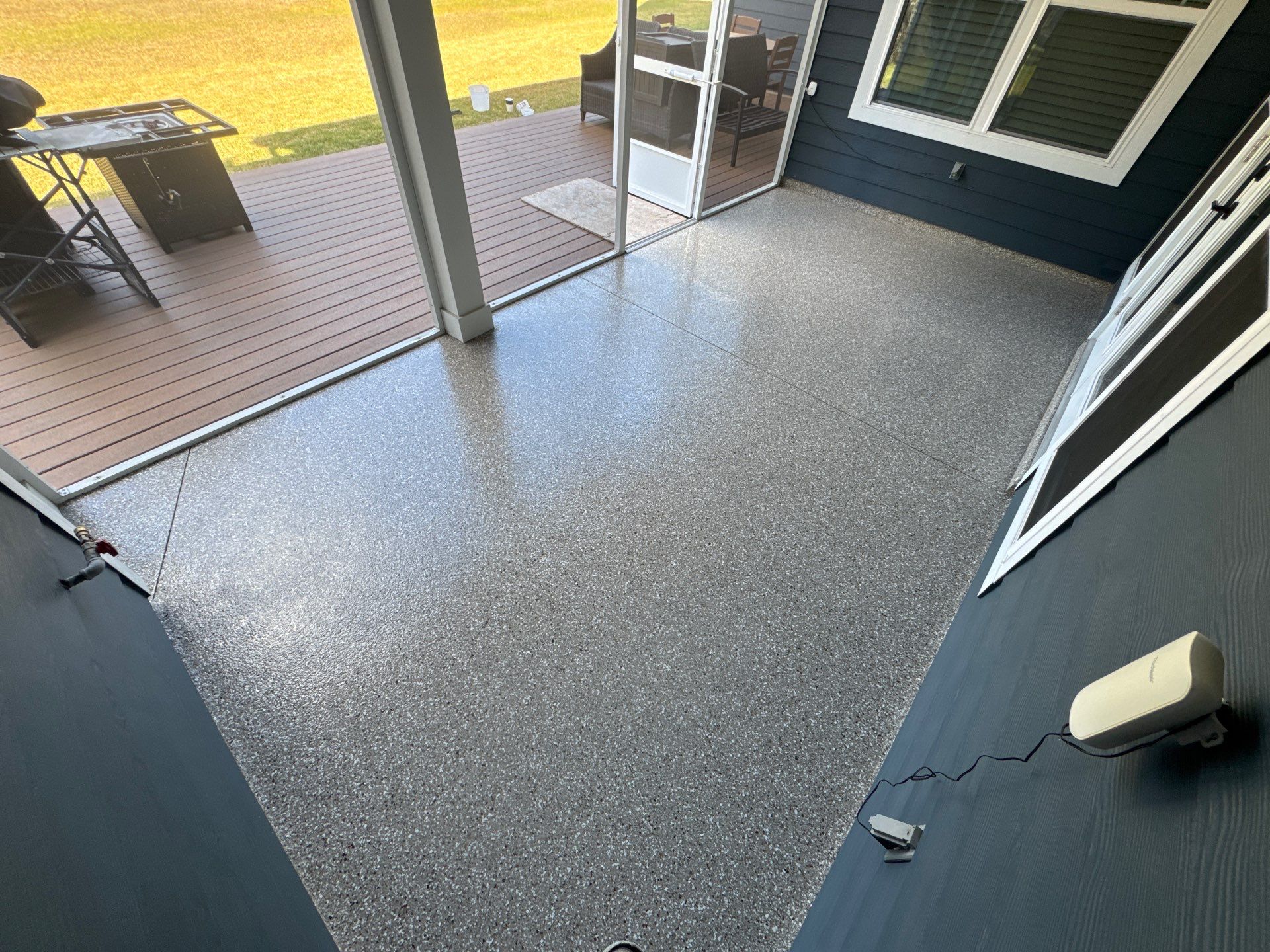 Front and Back Porches in Chiefland, FL in Pebble Beach by Cross Creek Concrete Coatings