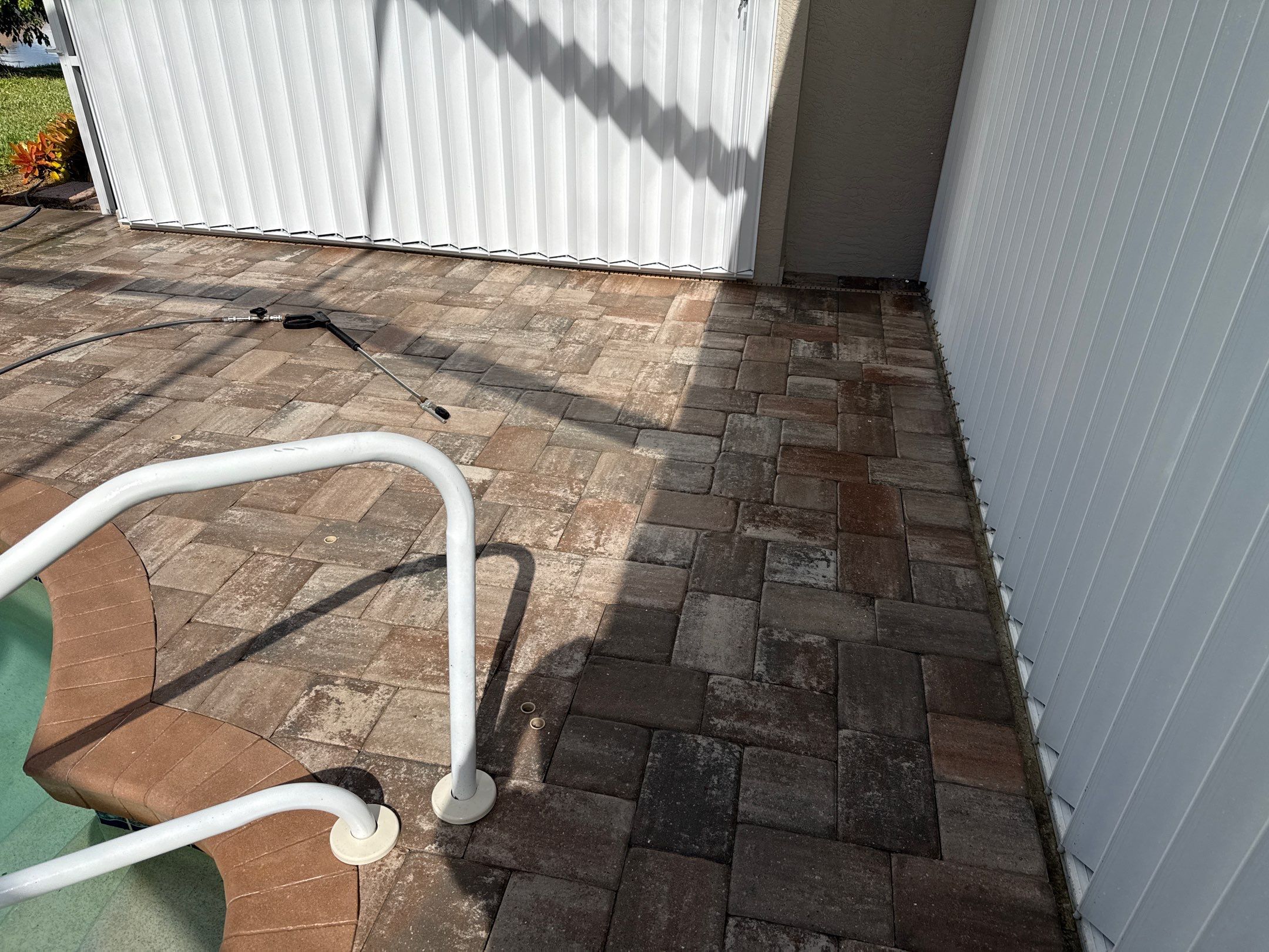 Paver Pool Deck & Screen Enclosure Transformation | University Park, Sarasota FL by Sunshine AquaWash